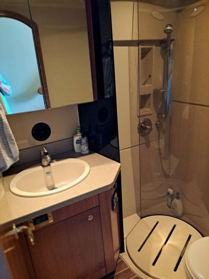 Bathroom in 2005 Rampage 45 Convertible boat.