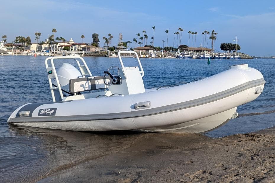 Manufacturer Provided Image: 2025 Tide Craft Catalina 13 boat on sandy shore with marina background.