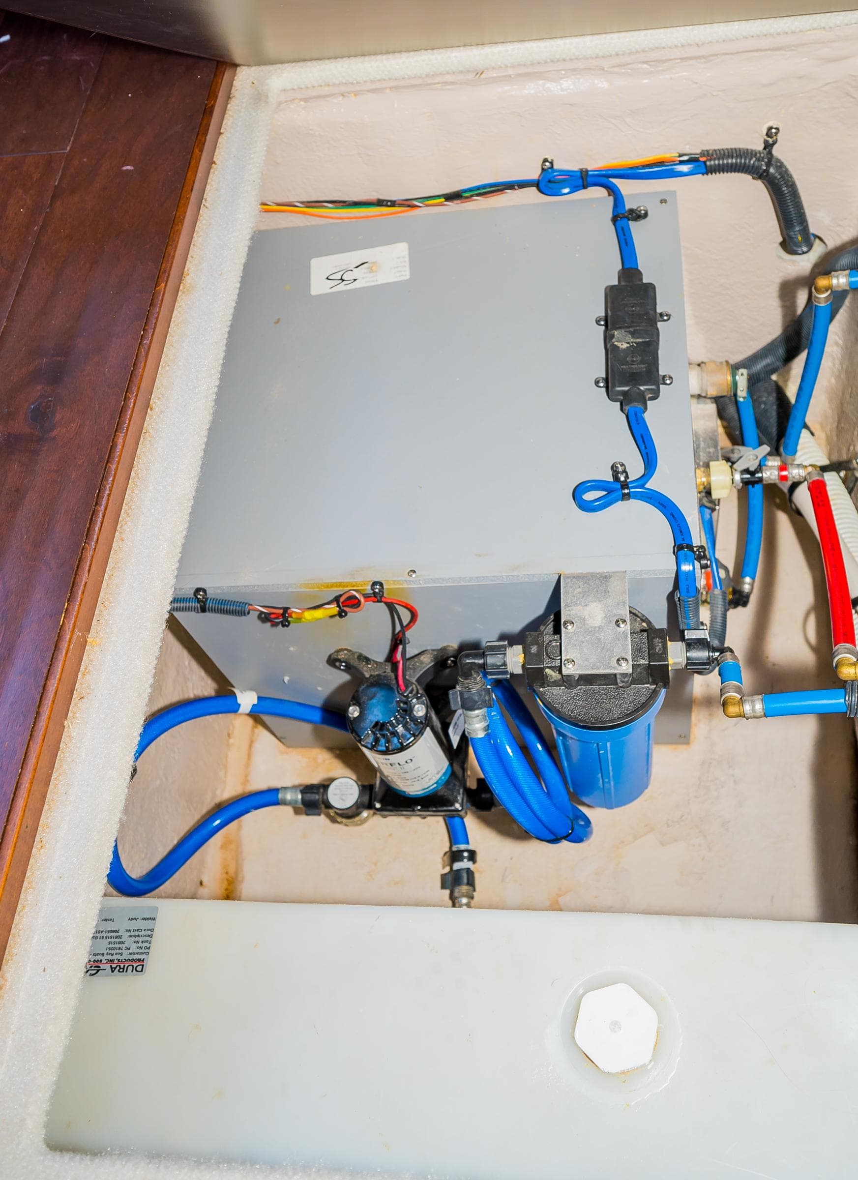 Electrical and plumbing system of a 2015 Sea Ray Sundancer 510 yacht.