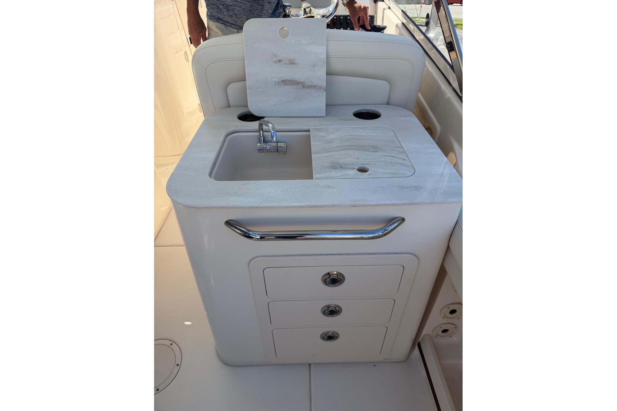 2022 Grady-White Freedom 275 boat sink and storage unit with sleek design.
