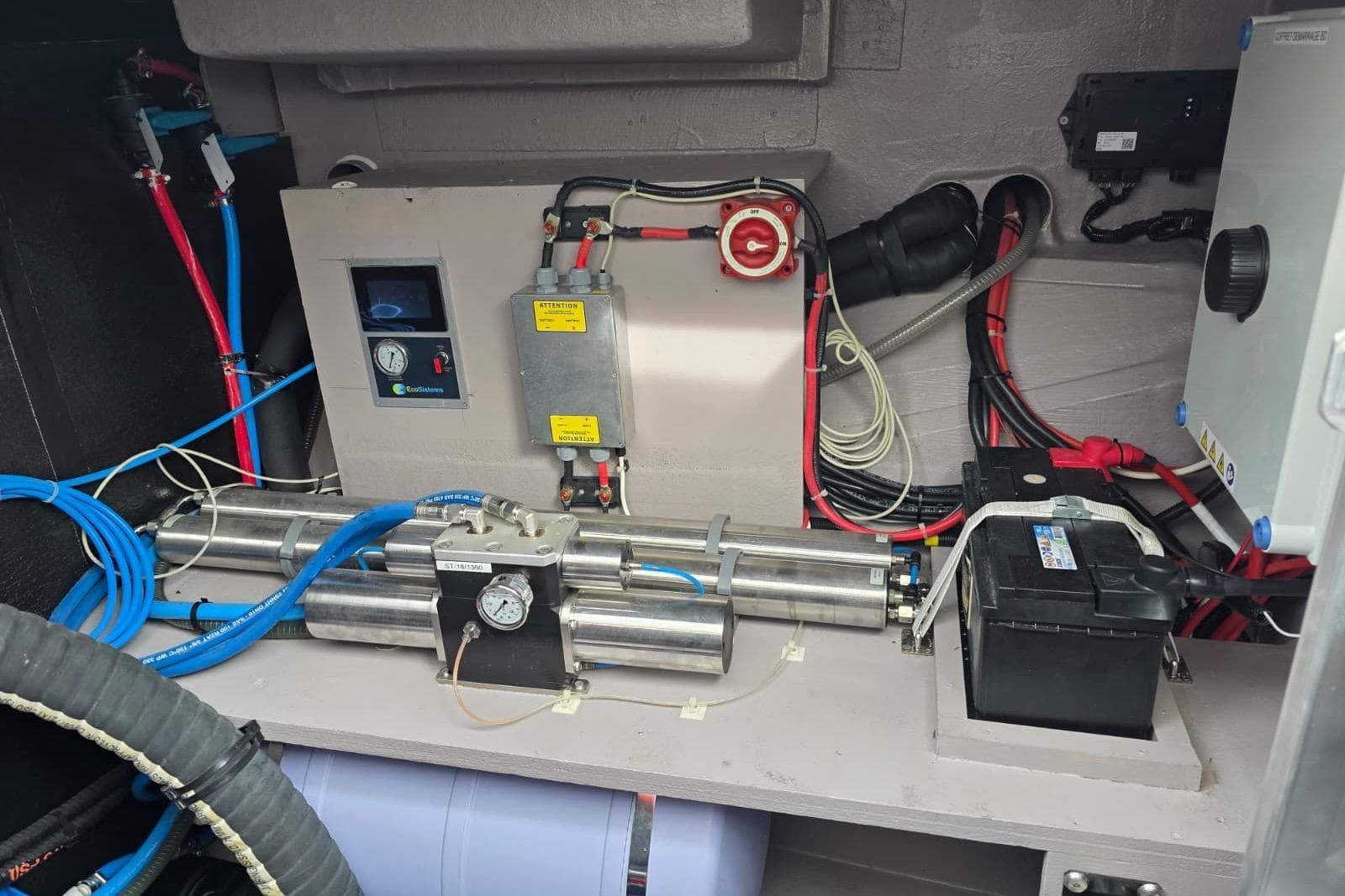 Engine compartment of a 2023 Bali 5.4 model with wiring and components.