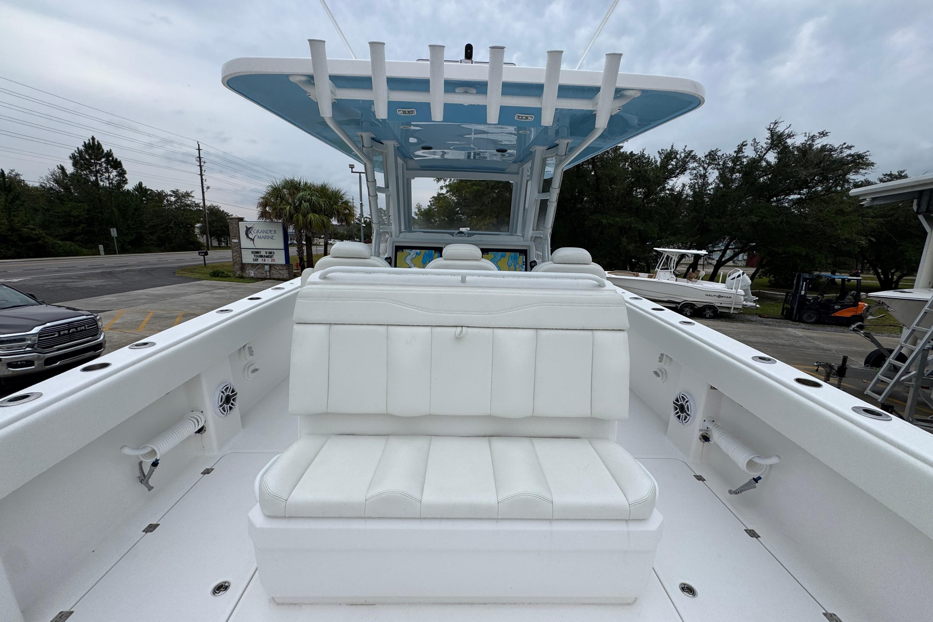 2025 Invincible 40 Catamaran with white seating and spacious deck.