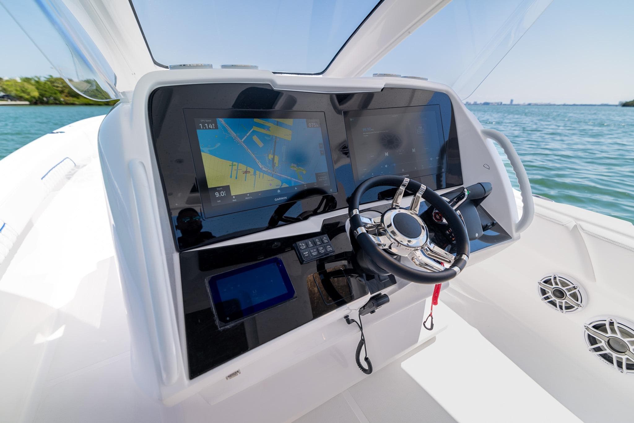 Deep Impact 369 Sport 2026 helm console on open water.