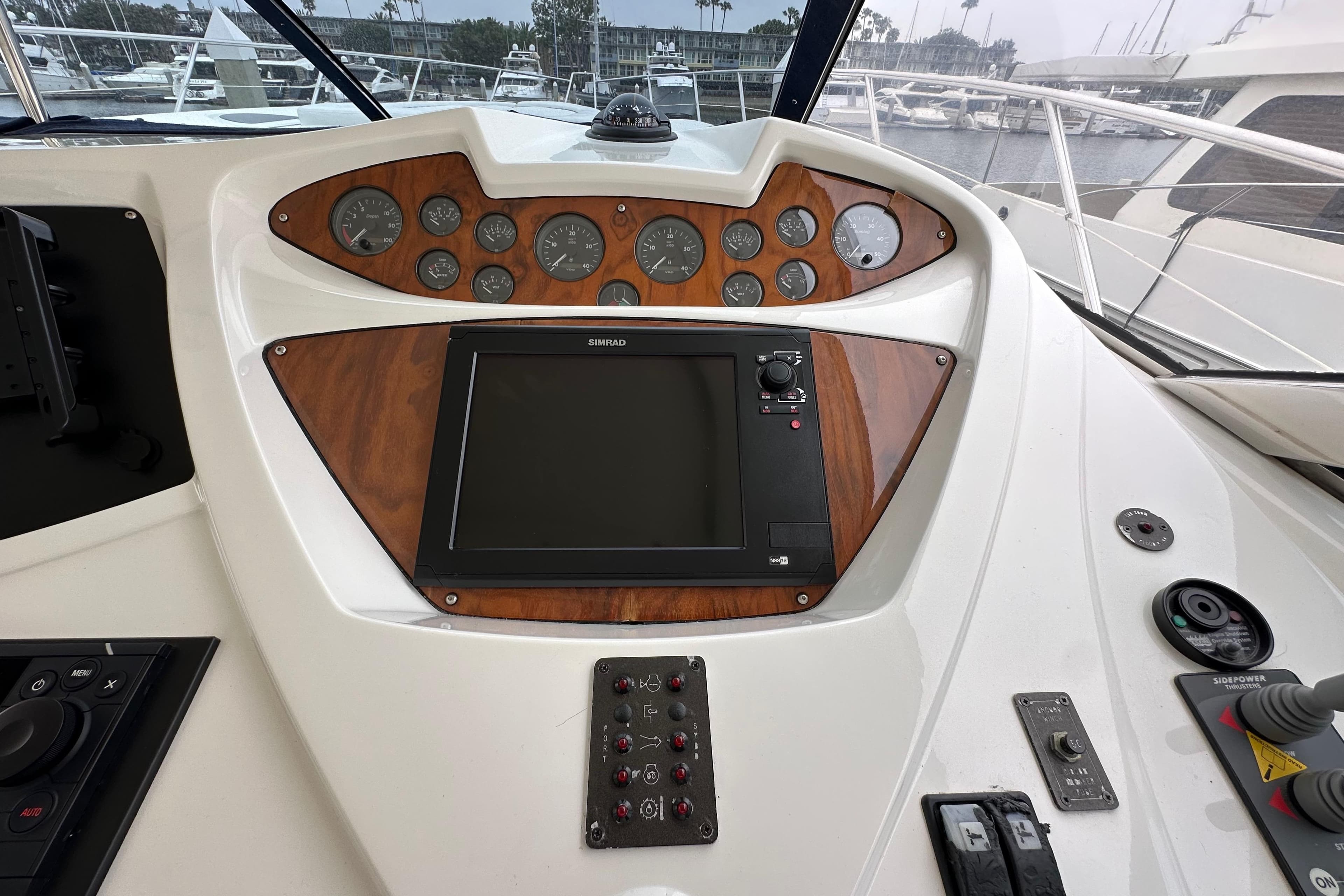 Control panel of a 2000 Sunseeker Predator 60 yacht with navigation instruments.