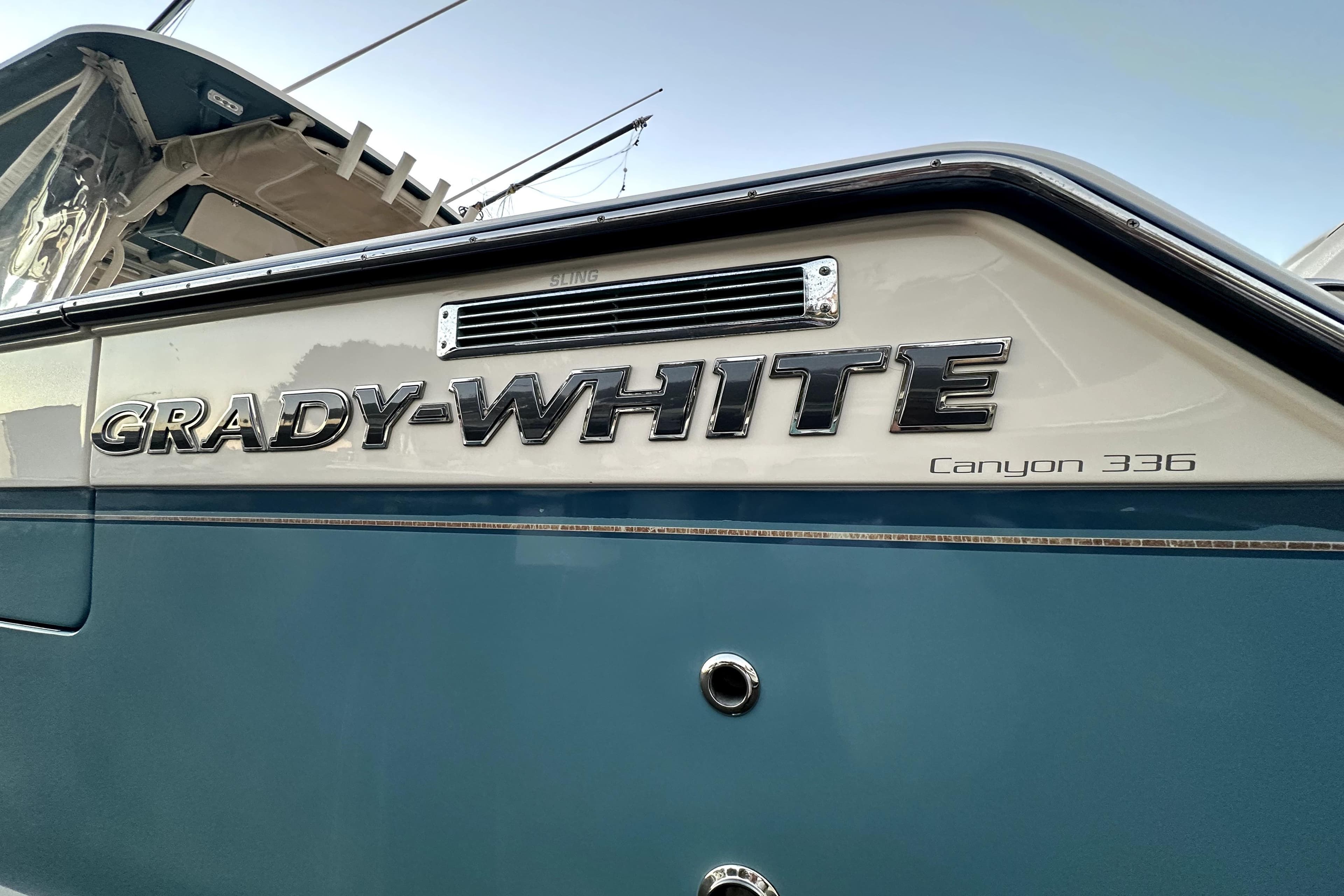 2019 Grady-White Canyon 336 boat, close-up of logo and model name.