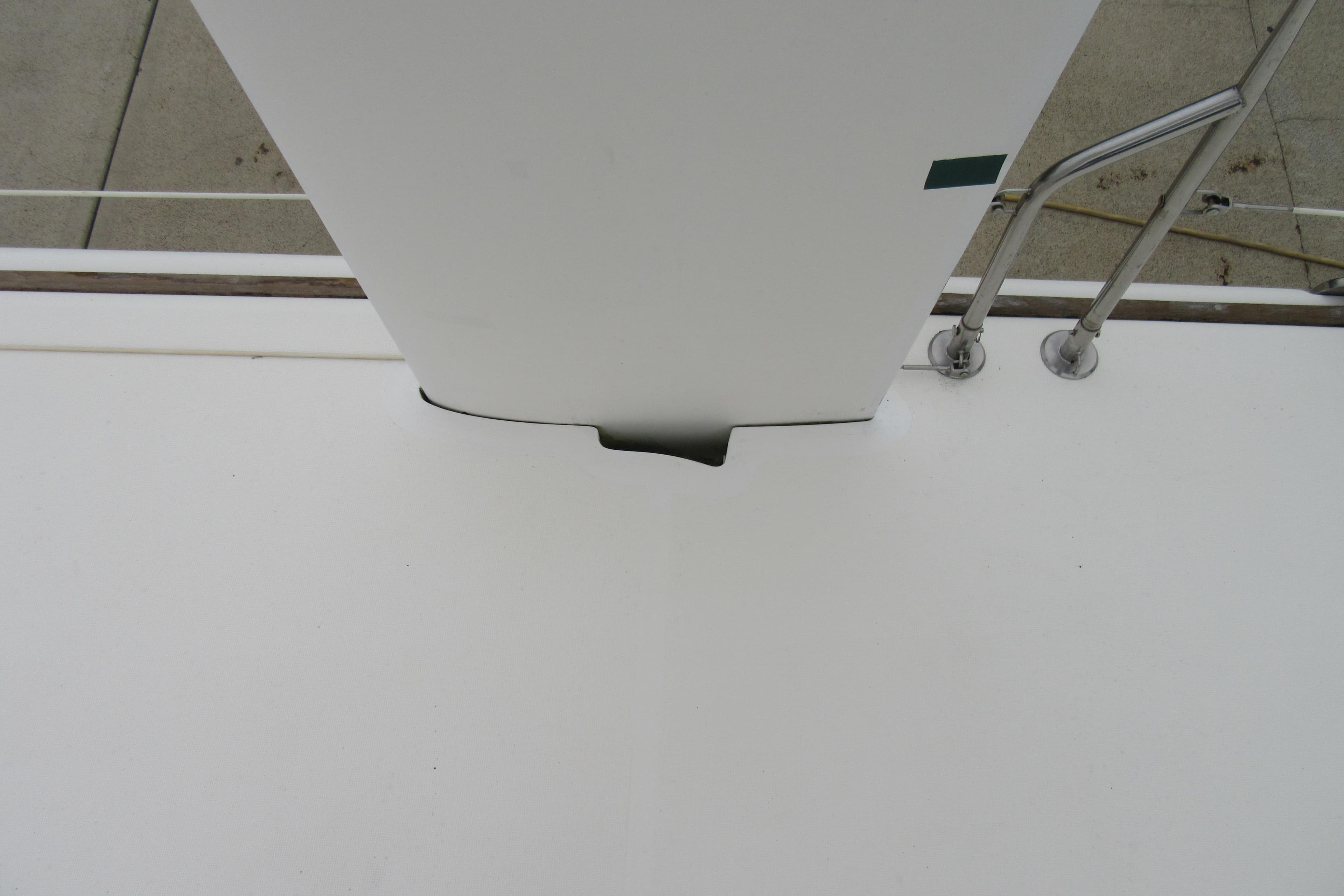 Catana 471 sailboat deck detail, 2001 model, featuring mast and railing.