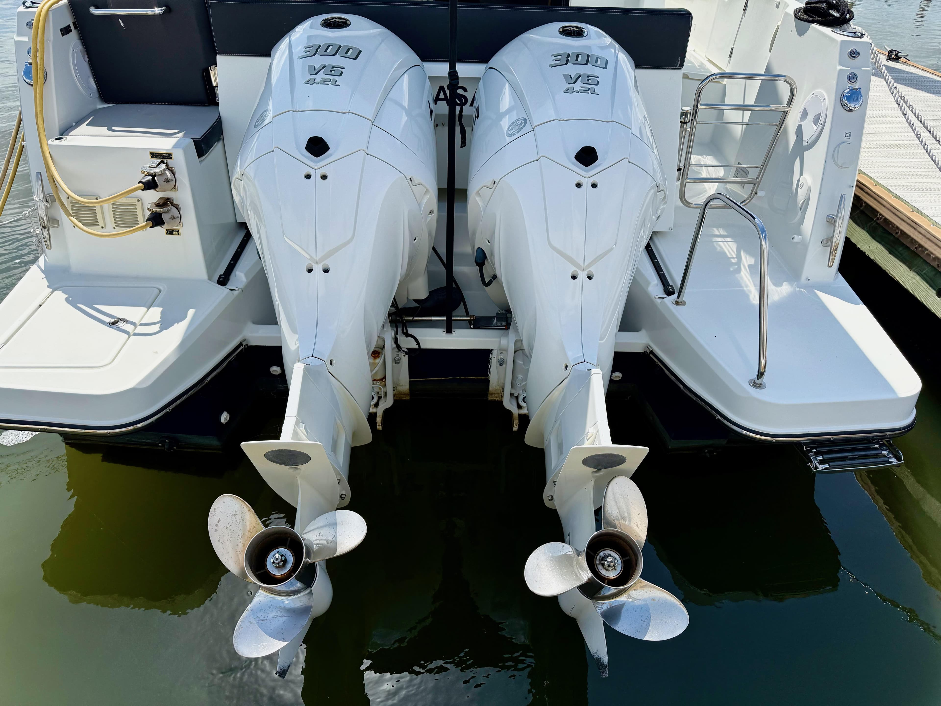 Twin 300 HP outboard engines on 2022 Jeanneau NC 1095 Coupe boat.