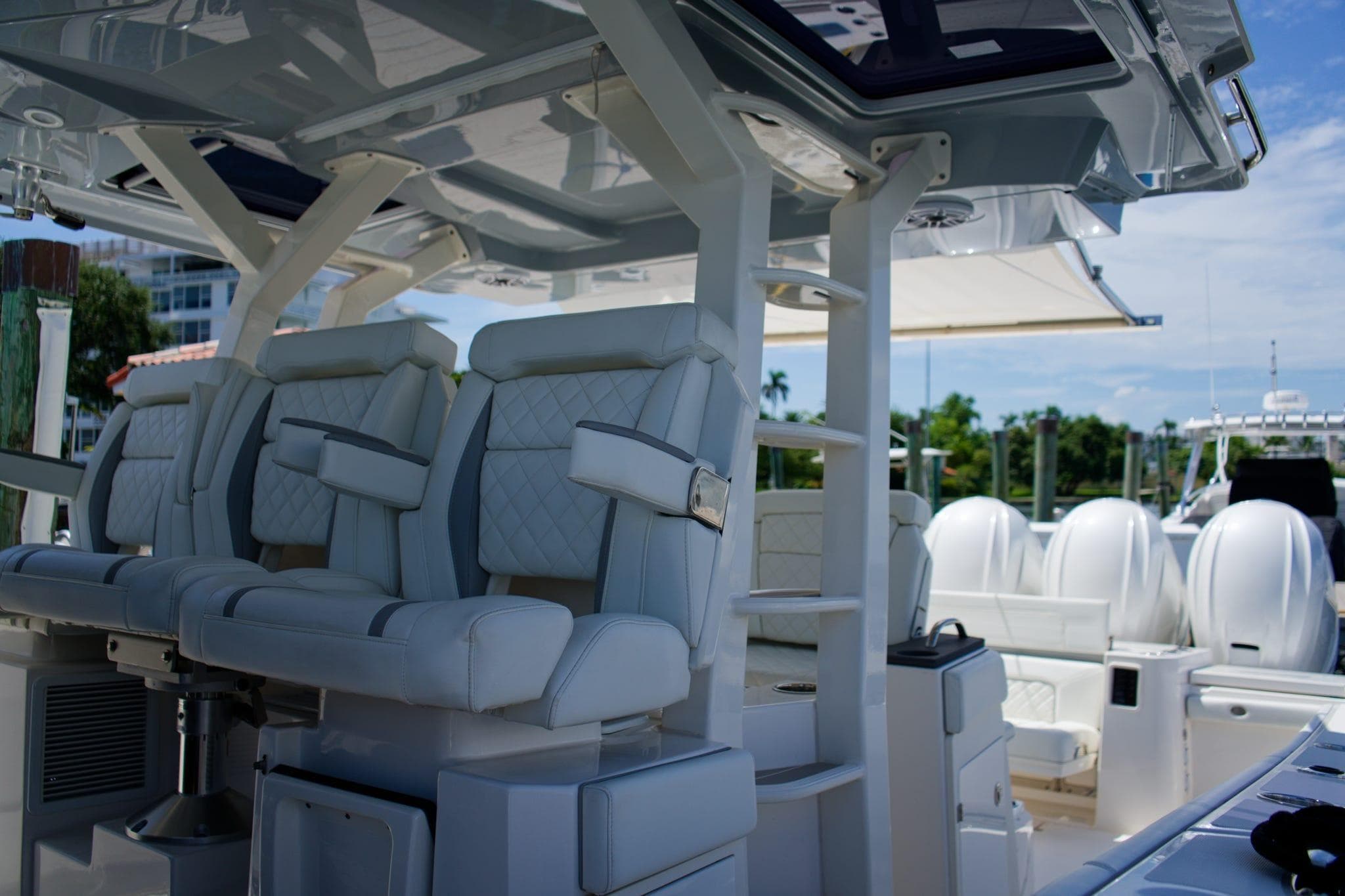 2022 Pursuit S 428 Sport boat interior with luxurious seating and modern design.