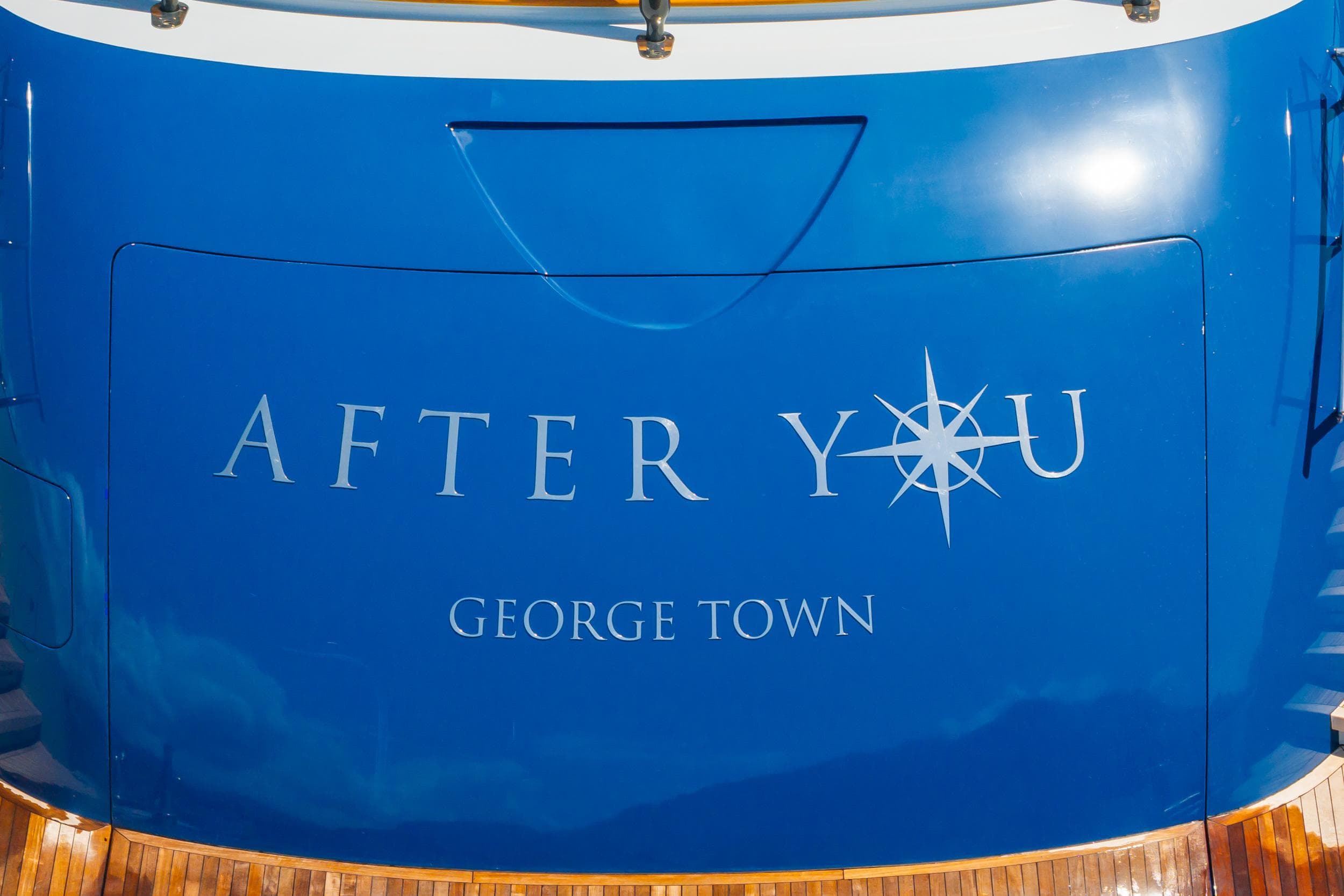 Heesen 55m yacht "After You" stern, George Town, 2011 model, blue hull.