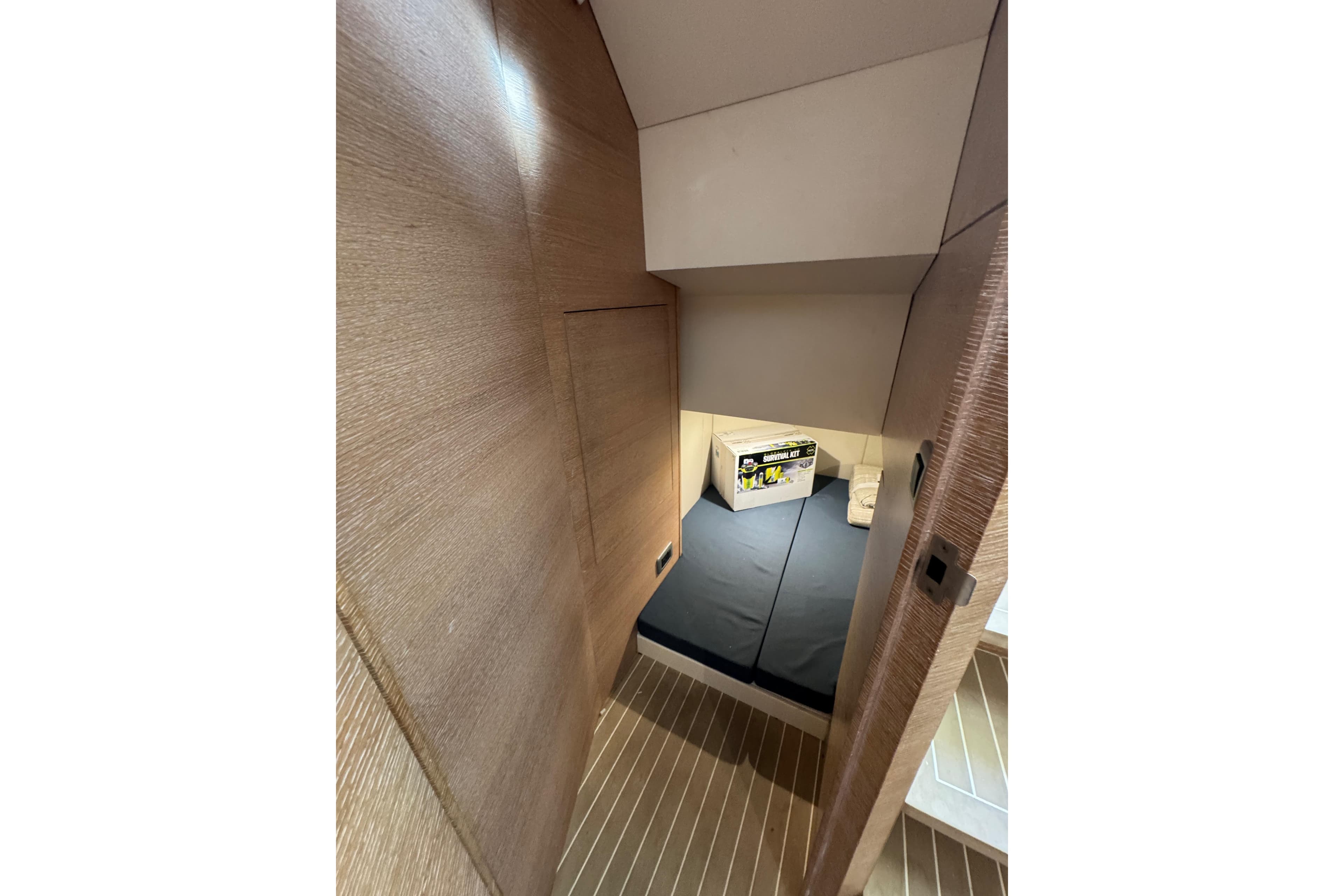 2020 Scout 530 LXF cabin interior with wooden finish and cozy bedding.