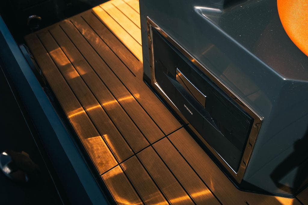 2024 Onda Magna boat interior with wooden flooring and modern design.