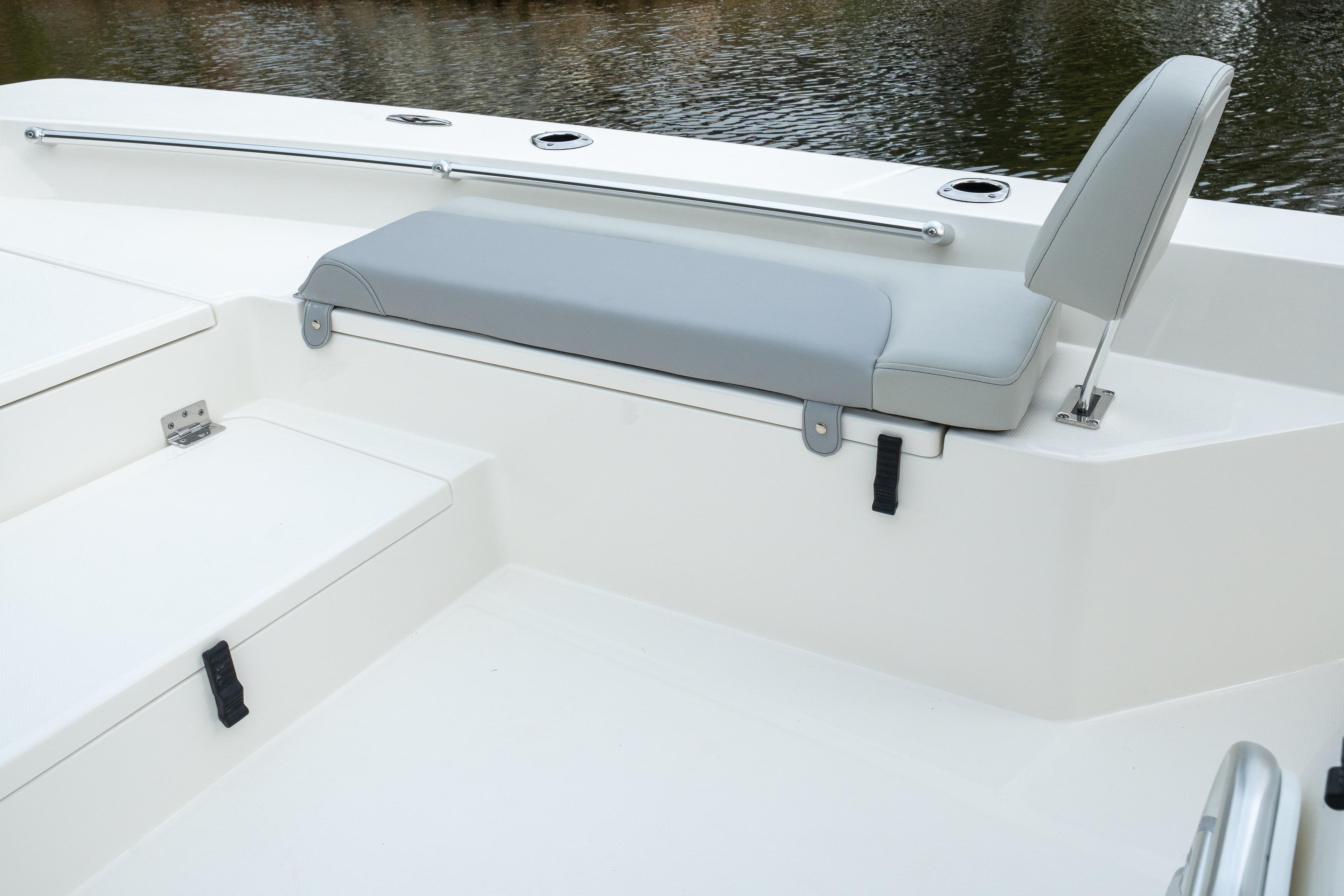 Bay Rider 2260 FS Skiff 2026 boat interior with gray seating and storage compartments.