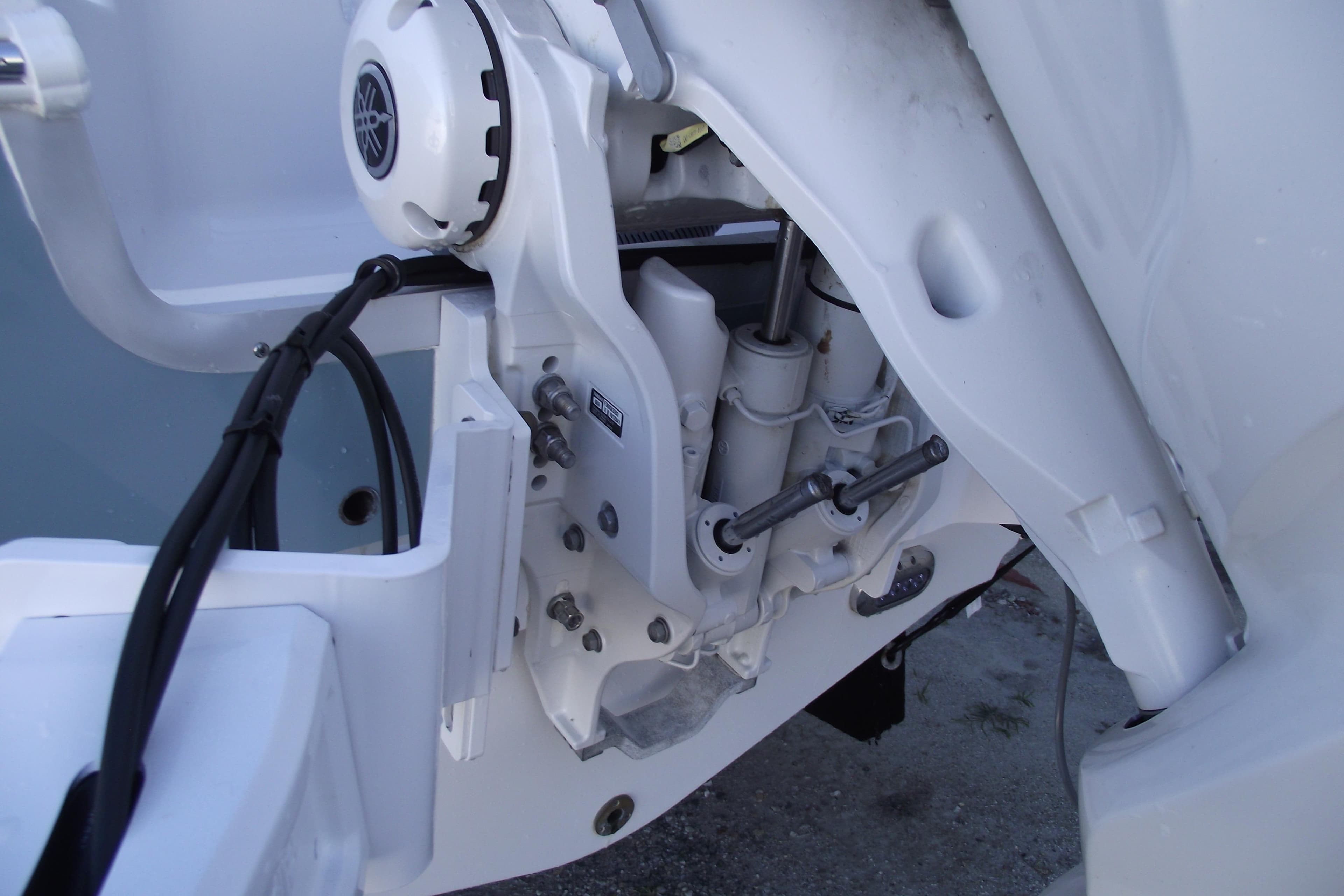 Close-up of 2023 Sea Hunt Ultra 255 SE boat engine components.