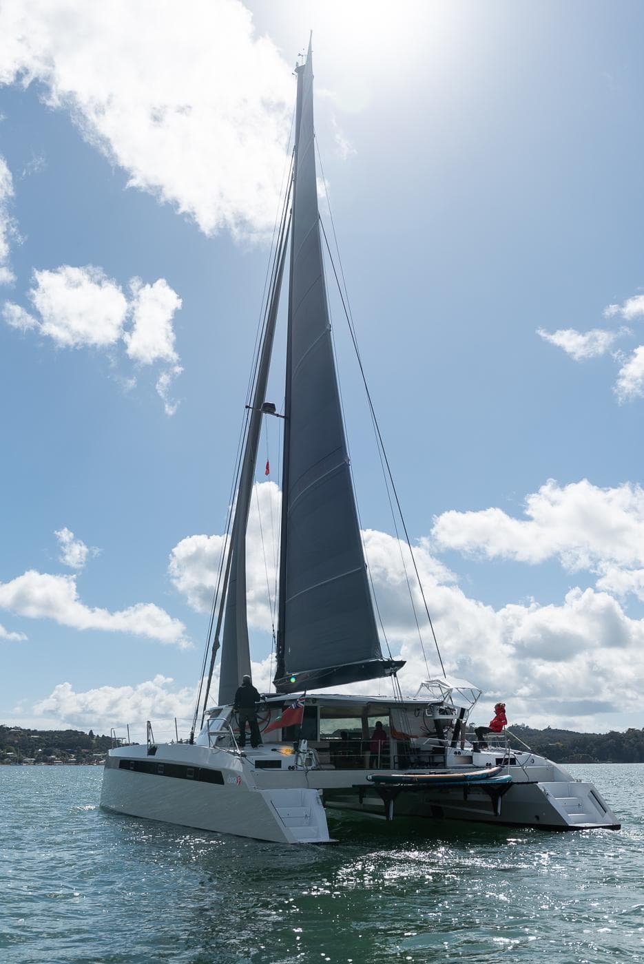 Alibi 54 catamaran from 2014 sailing under sunny skies.