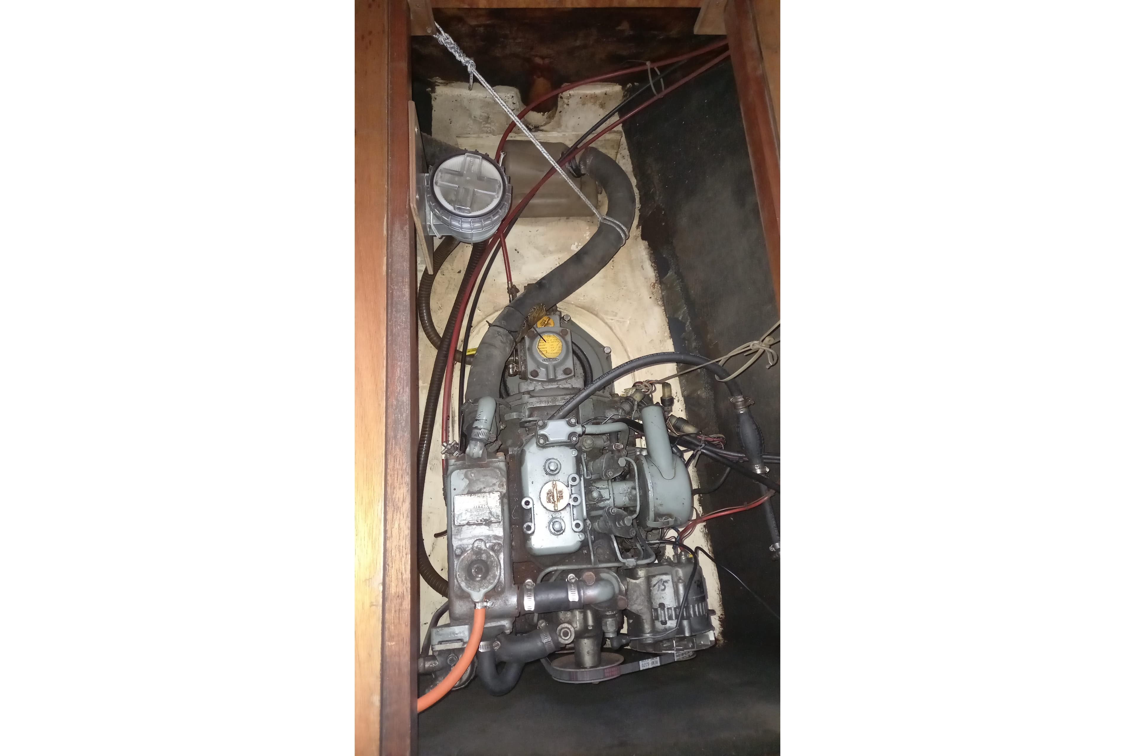 Engine compartment of a 1993 Fountaine Pajot Antigua 37 catamaran, showing mechanical components.