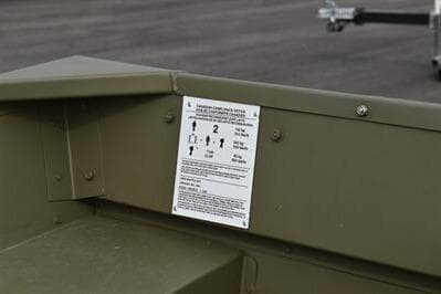 2025 Lowe L1240 Jon boat interior with safety instructions label.