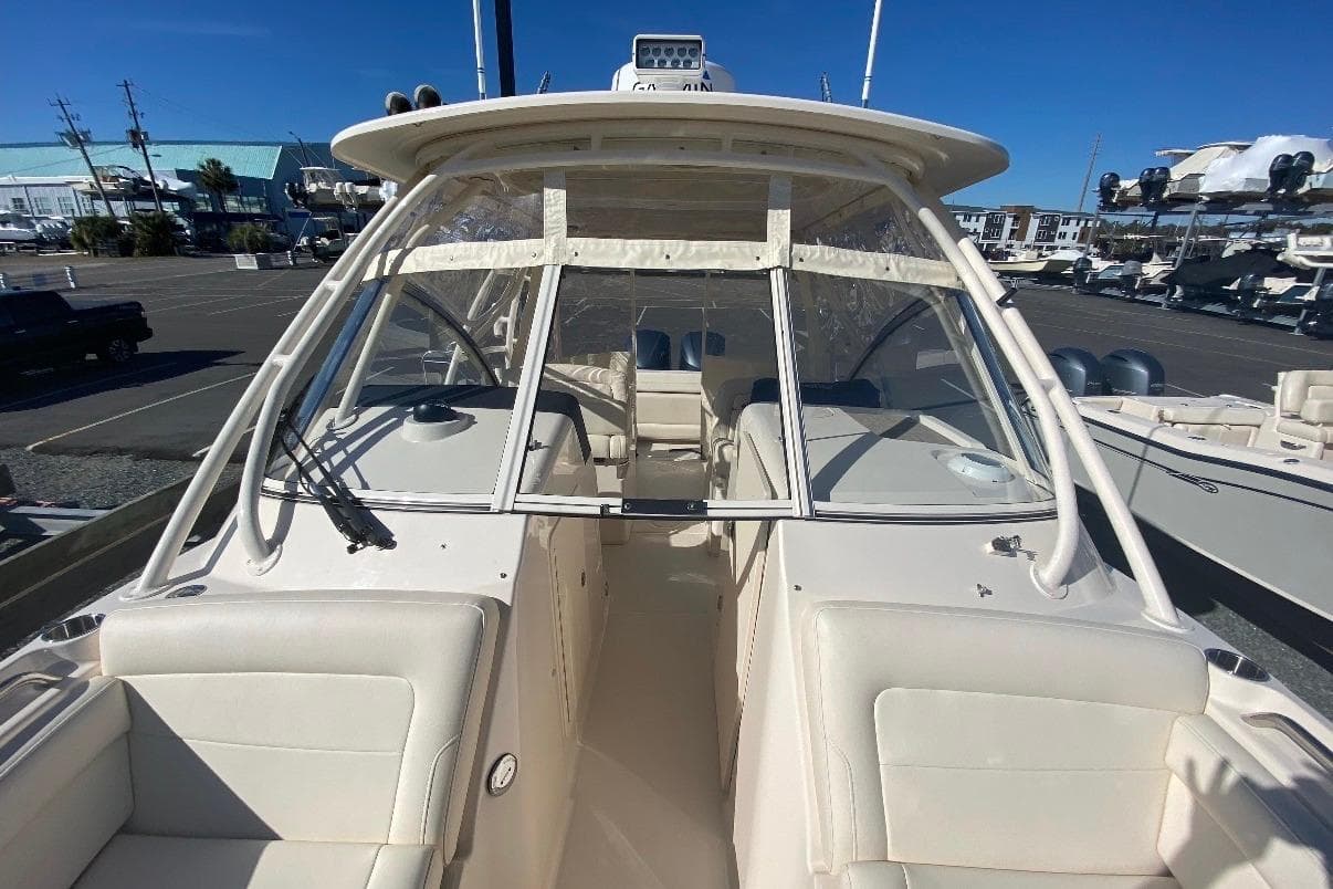 2020 Grady-White Freedom 285 boat with spacious seating and clear windshield.