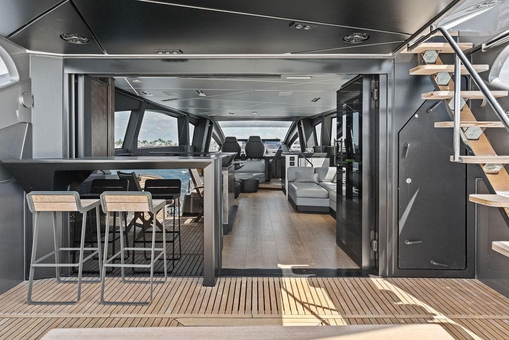 Luxurious interior of 2025 Pershing GTX 80 yacht with modern seating and sleek design.