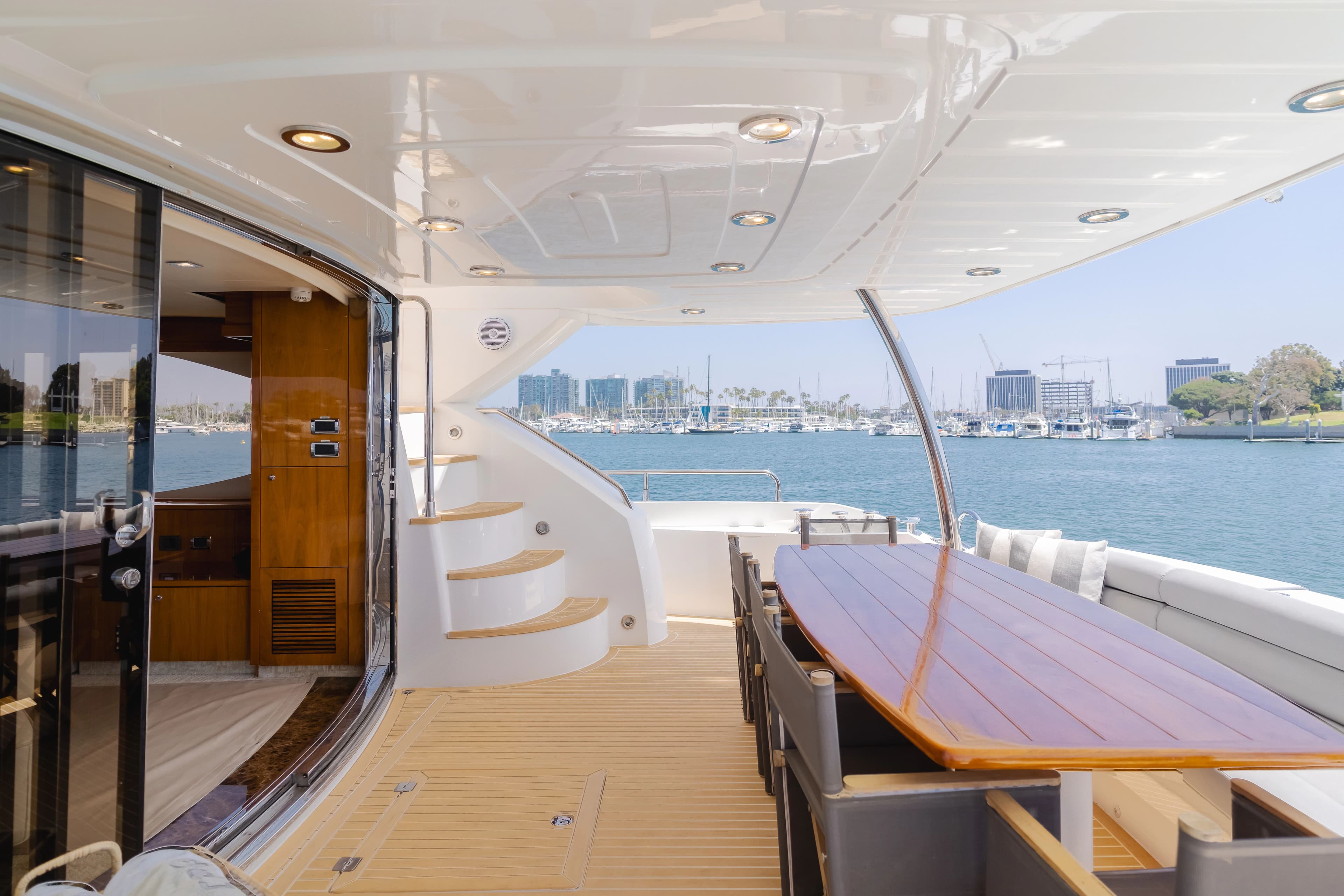 Luxurious Sunseeker 88 Yacht deck overlooking the harbor.