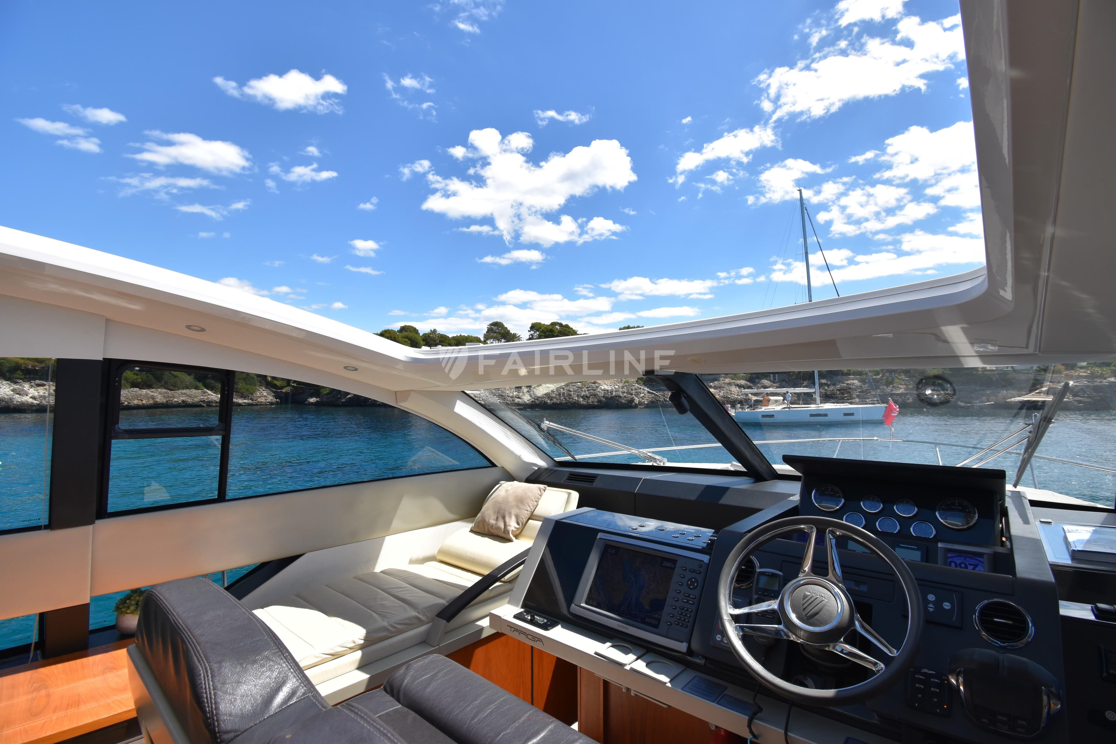 Luxurious 2012 Fairline Targa 50 GT yacht interior with scenic ocean view.