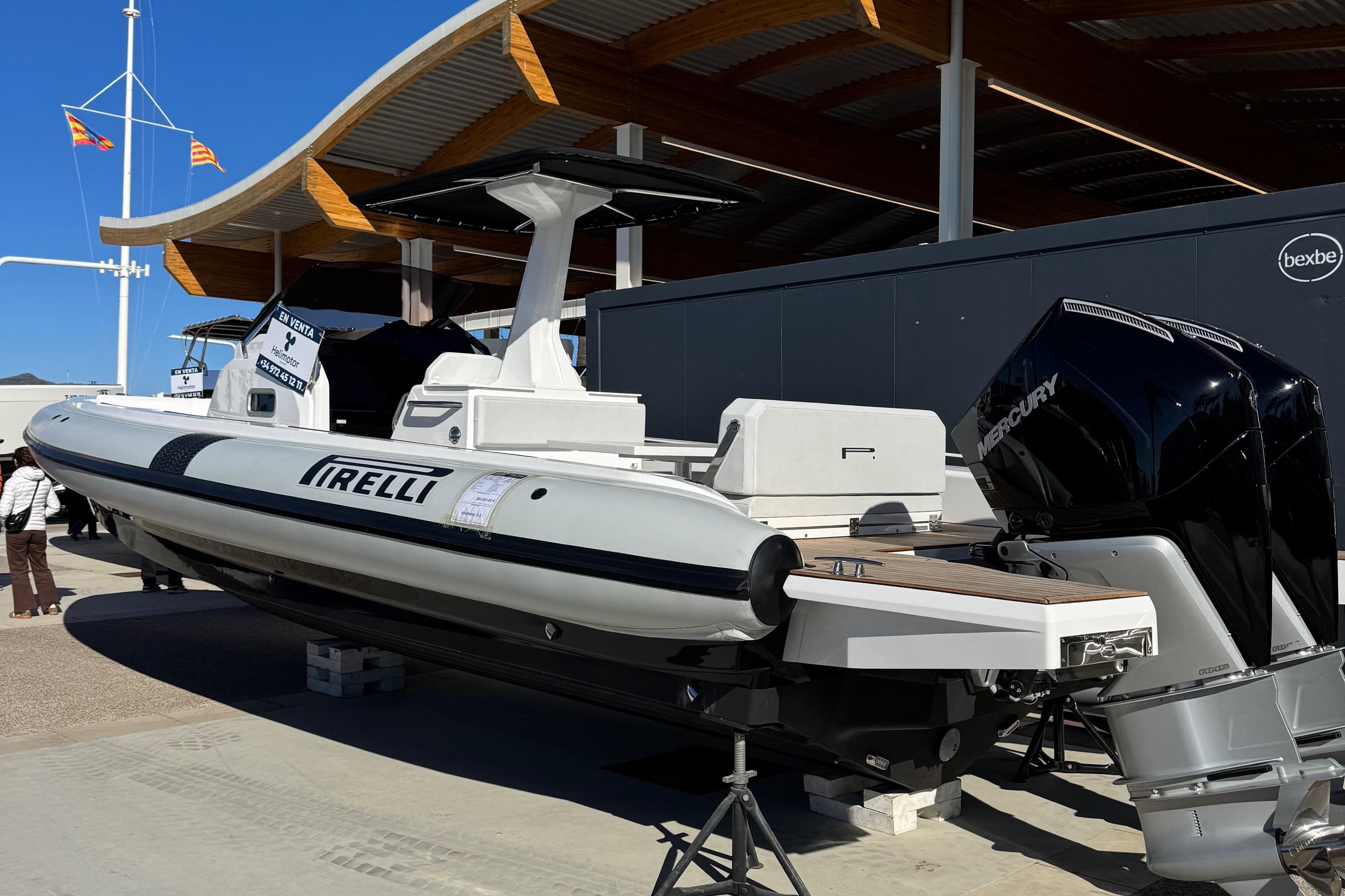 2026 Pirelli 30 boat with Mercury engines displayed outdoors.