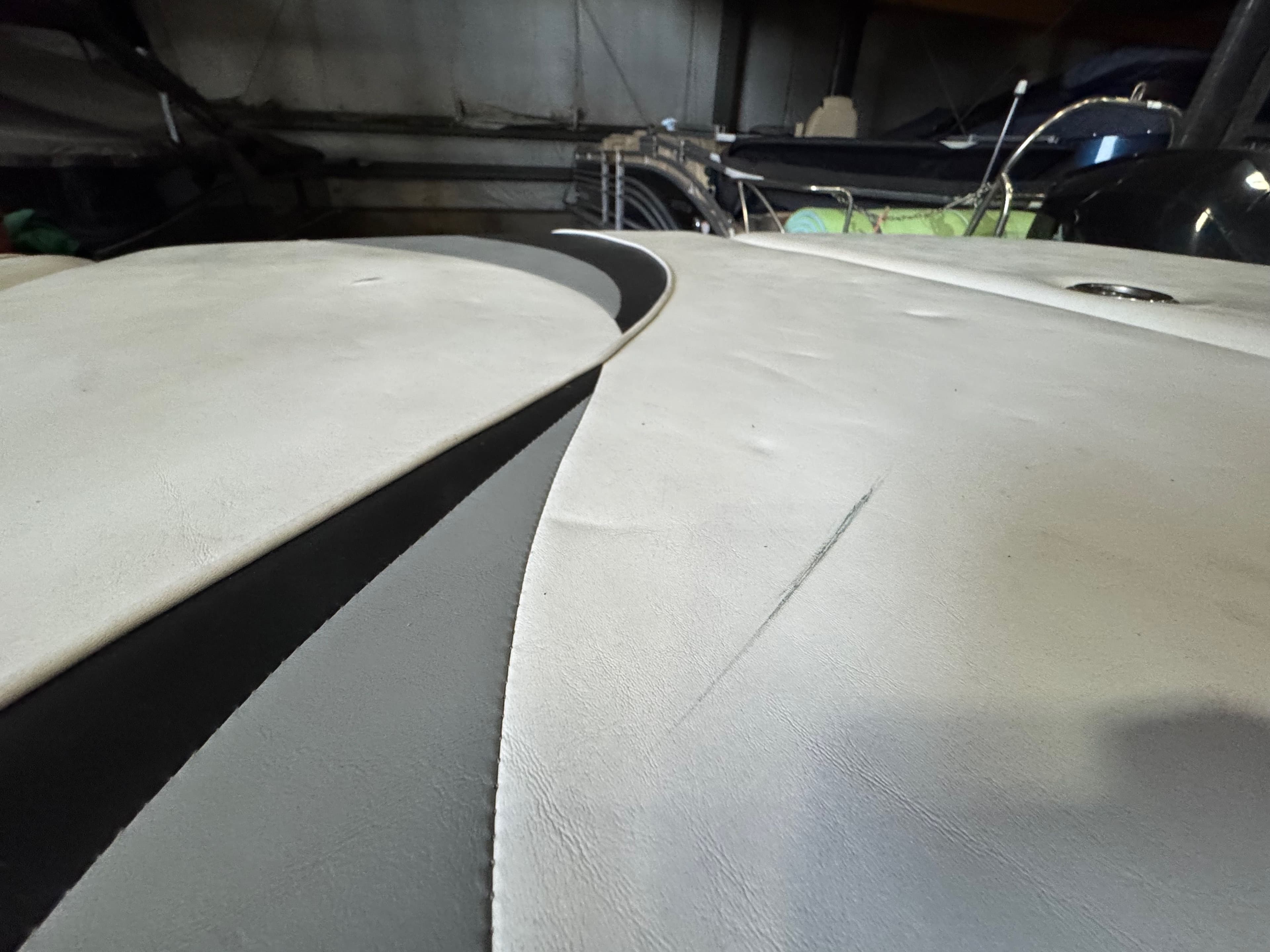 Close-up of seat upholstery on a 2006 Correct Craft Air Nautique 210.