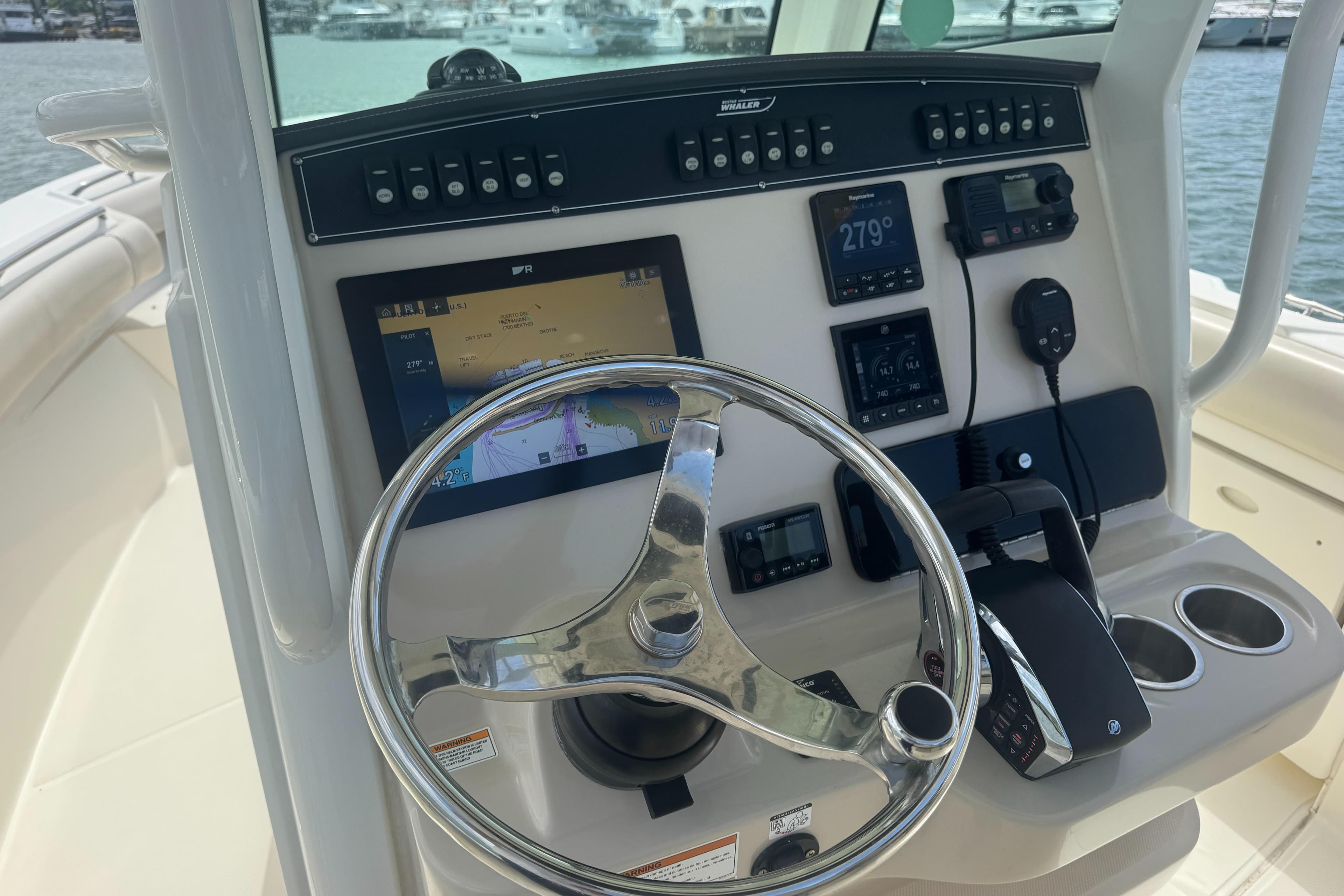 2022 Boston Whaler 280 Outrage helm with advanced navigation and control systems.