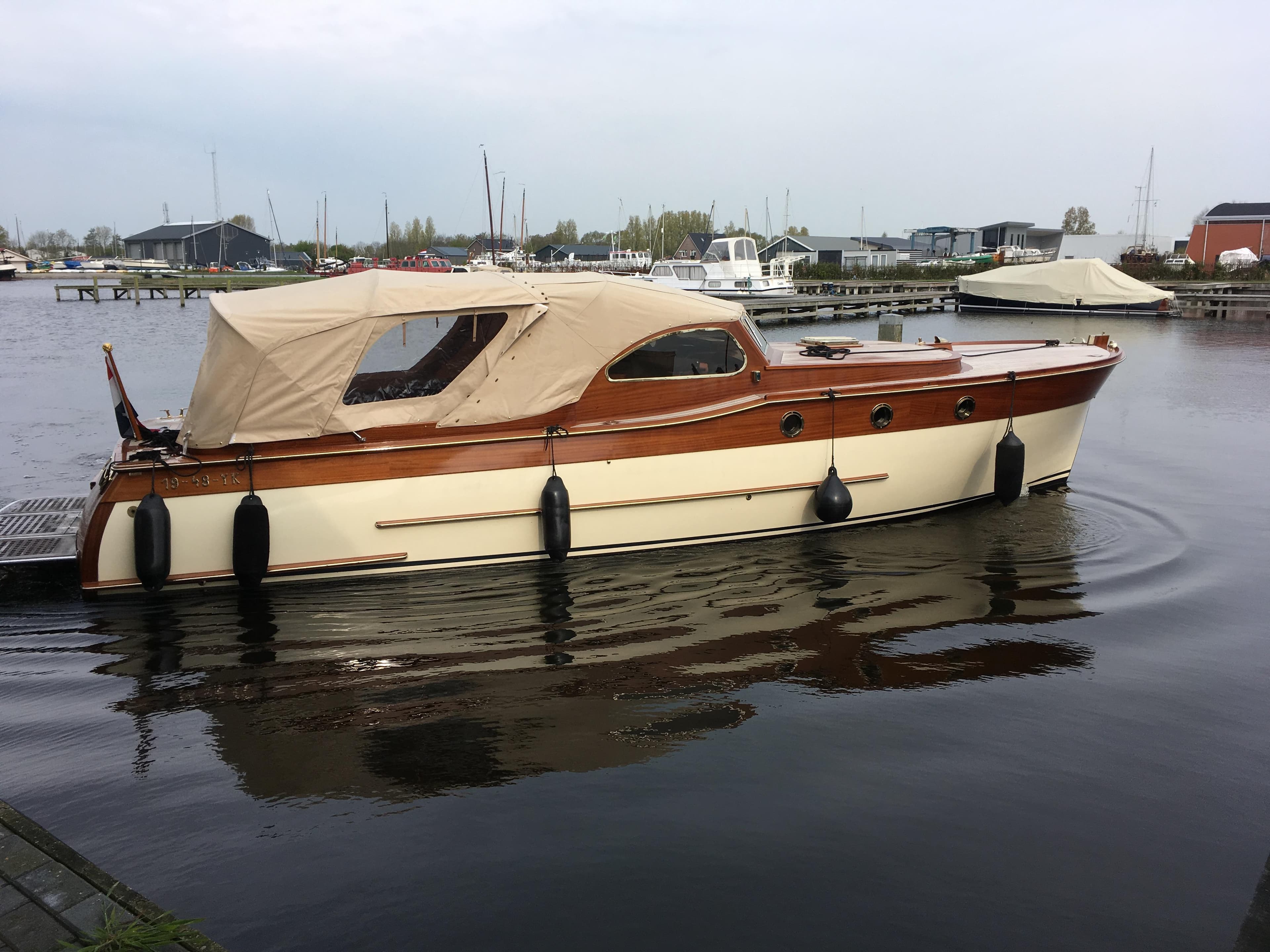 2005 Breedendam MTB 31 boat docked in a marina, featuring classic wooden design.