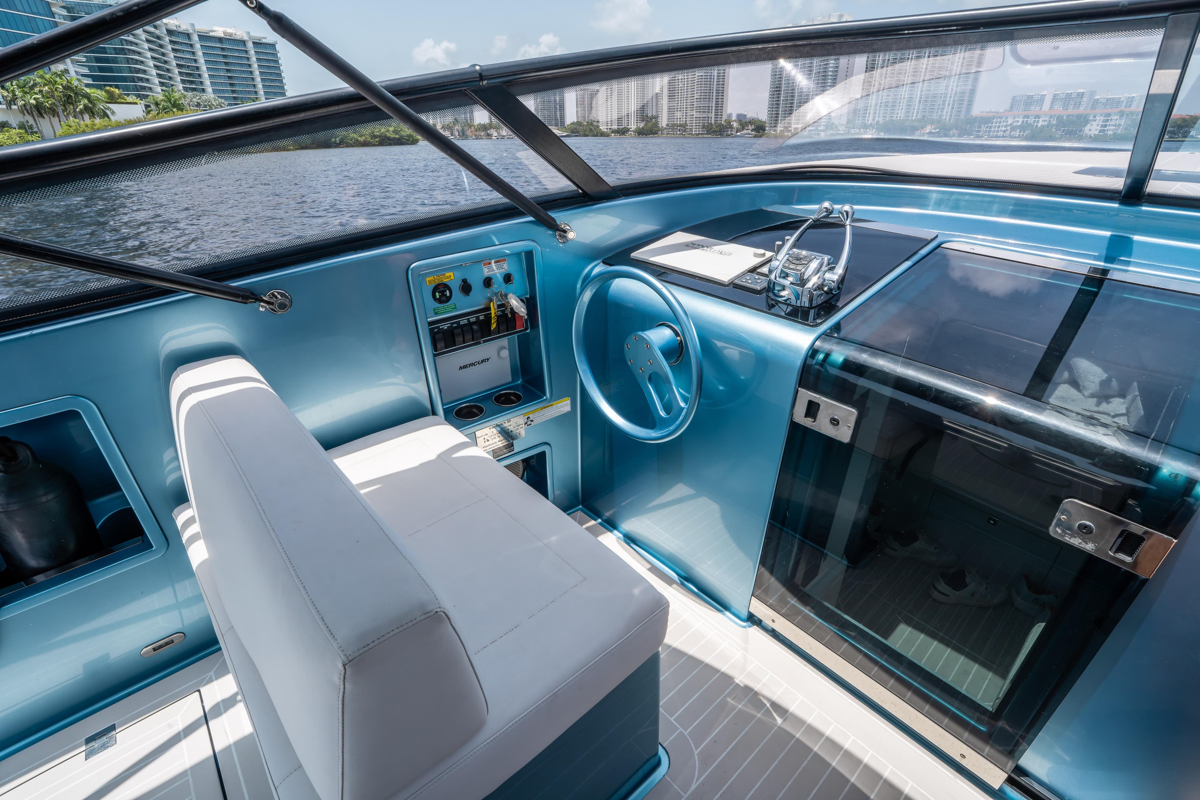 Interior of a 2018 VanDutch 30 boat with modern controls and sleek design.