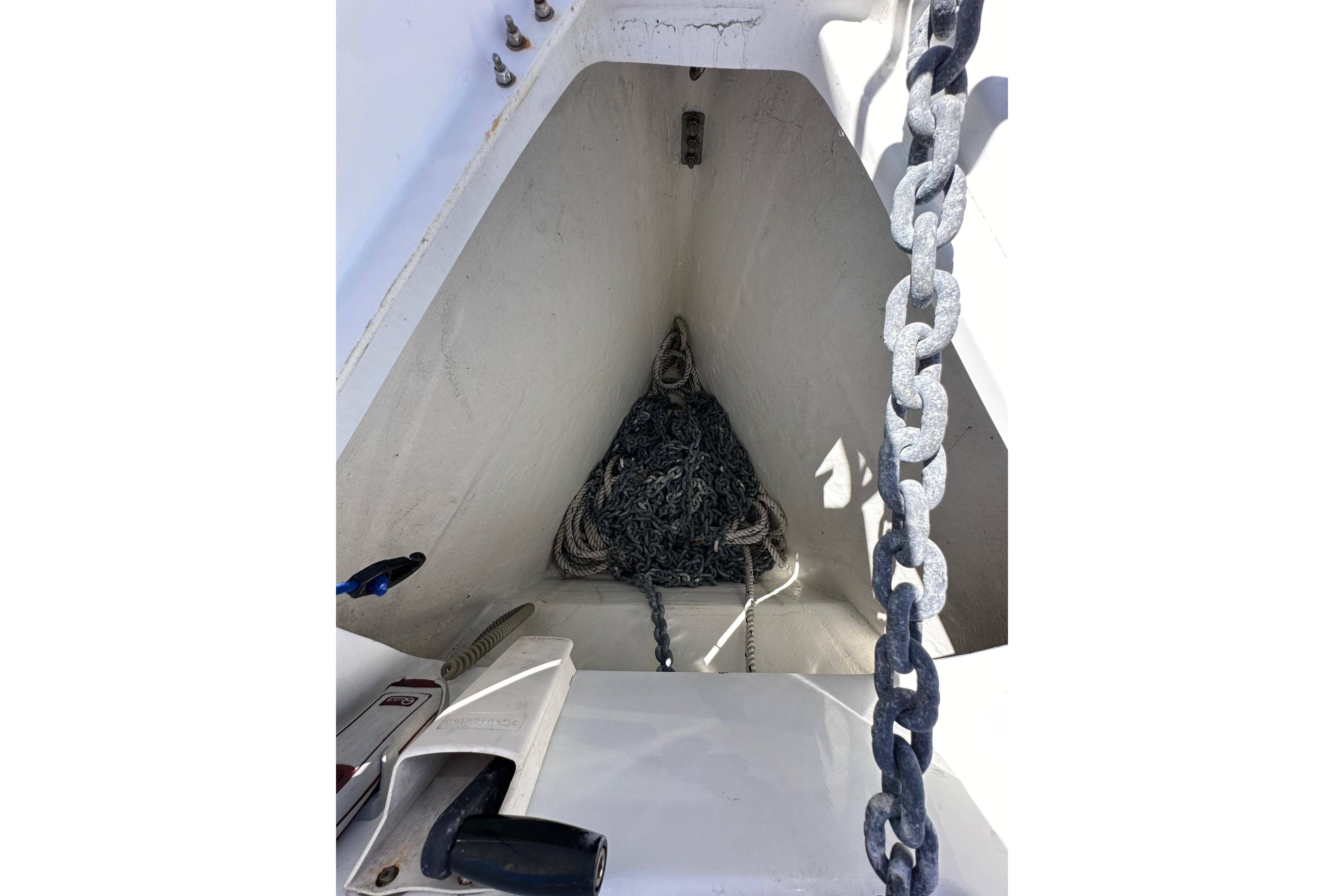 Anchor chain locker of 2015 Jeanneau Sun Odyssey 409 sailboat.