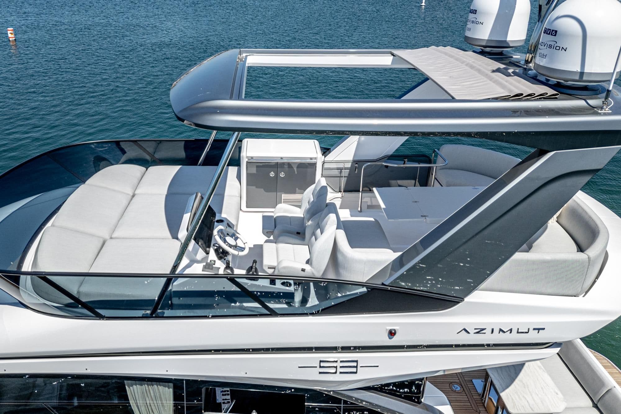 2024 Azimut Fly 53 yacht with spacious flybridge and modern design on the water.