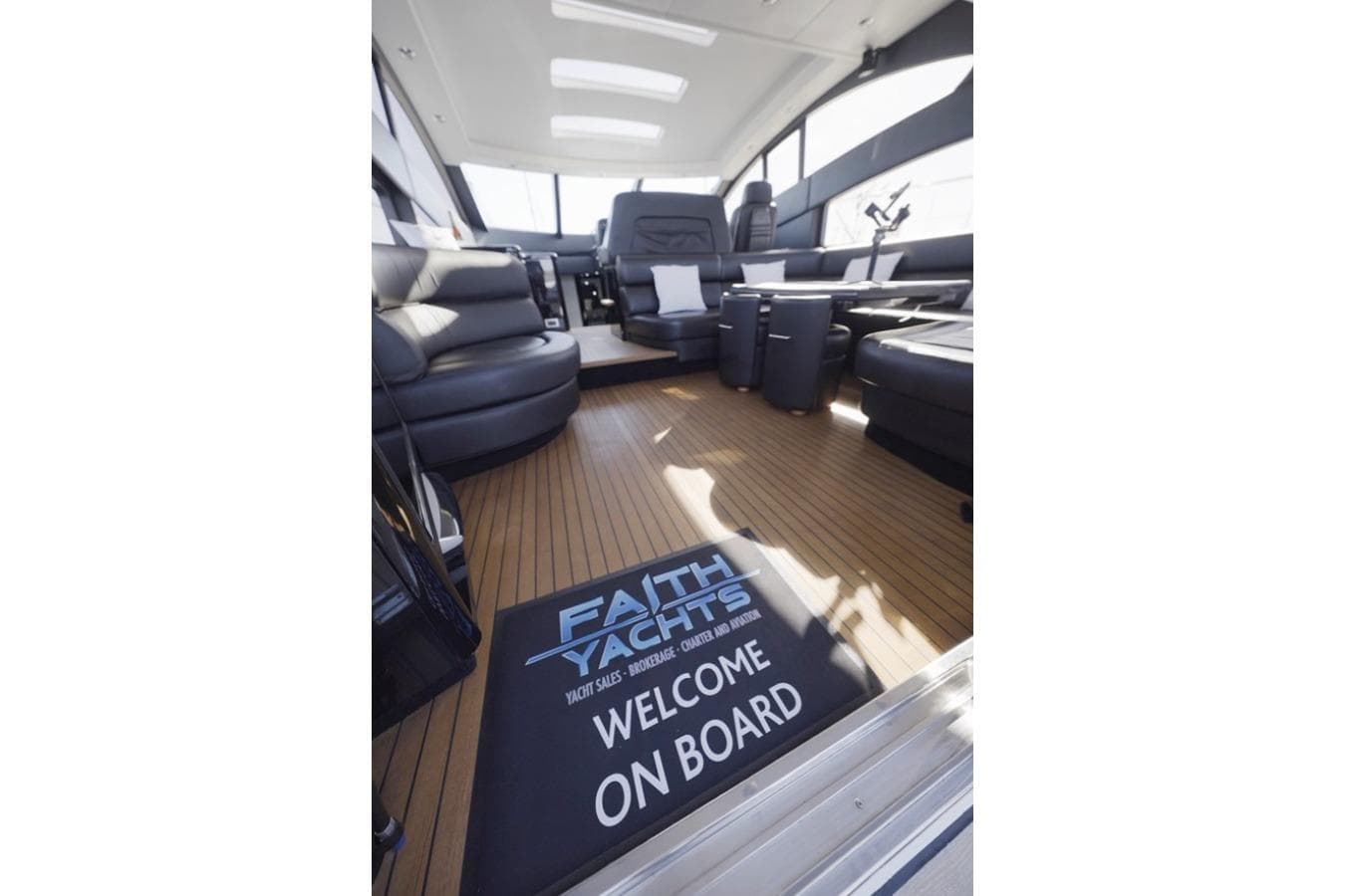Luxurious interior of 2007 Sunseeker Predator 62 yacht with welcome mat.