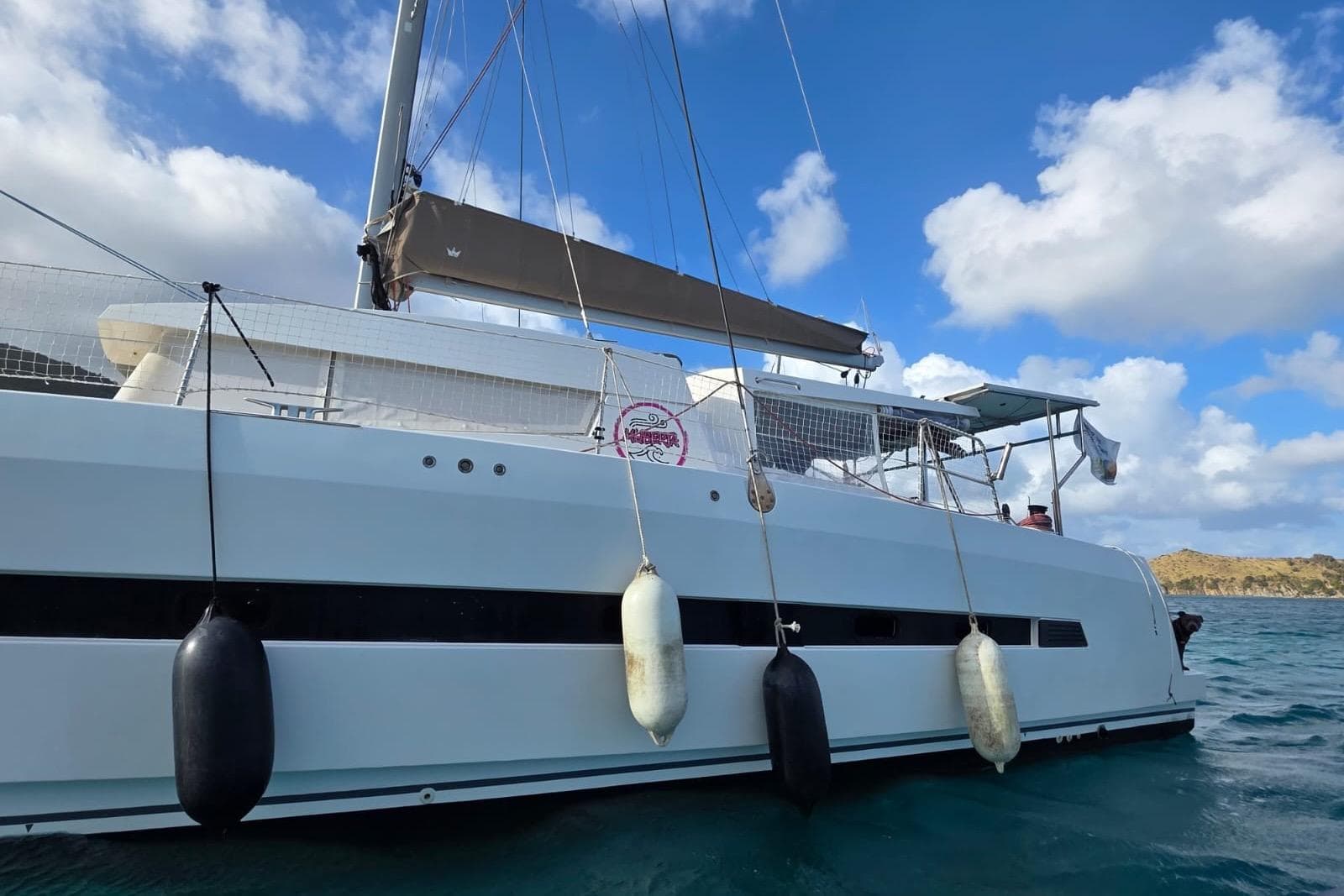 Sailing catamaran Bali 4.5, 2016 model, anchored in clear blue waters.