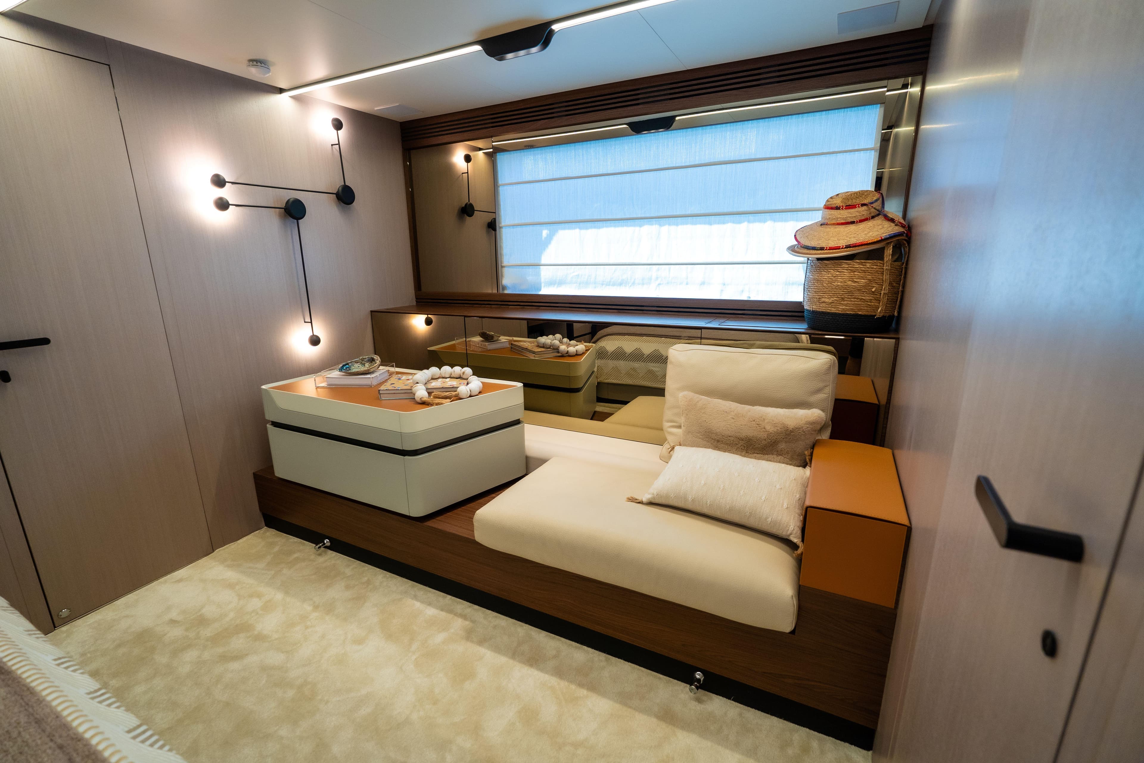 Luxurious interior of 2024 Azimut S7 yacht with modern seating and elegant decor.