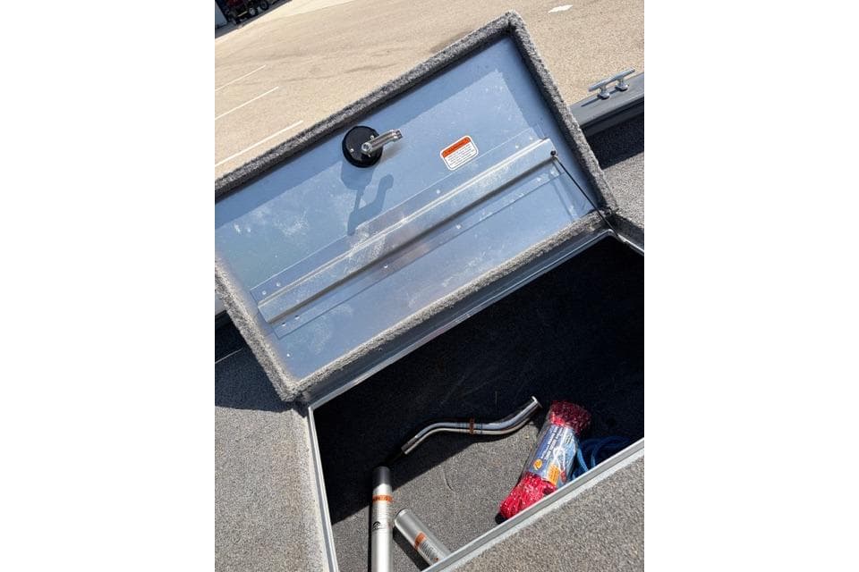 Open storage compartment in 2016 Tracker Pro Team 195 TXW Tournament Edition boat.
