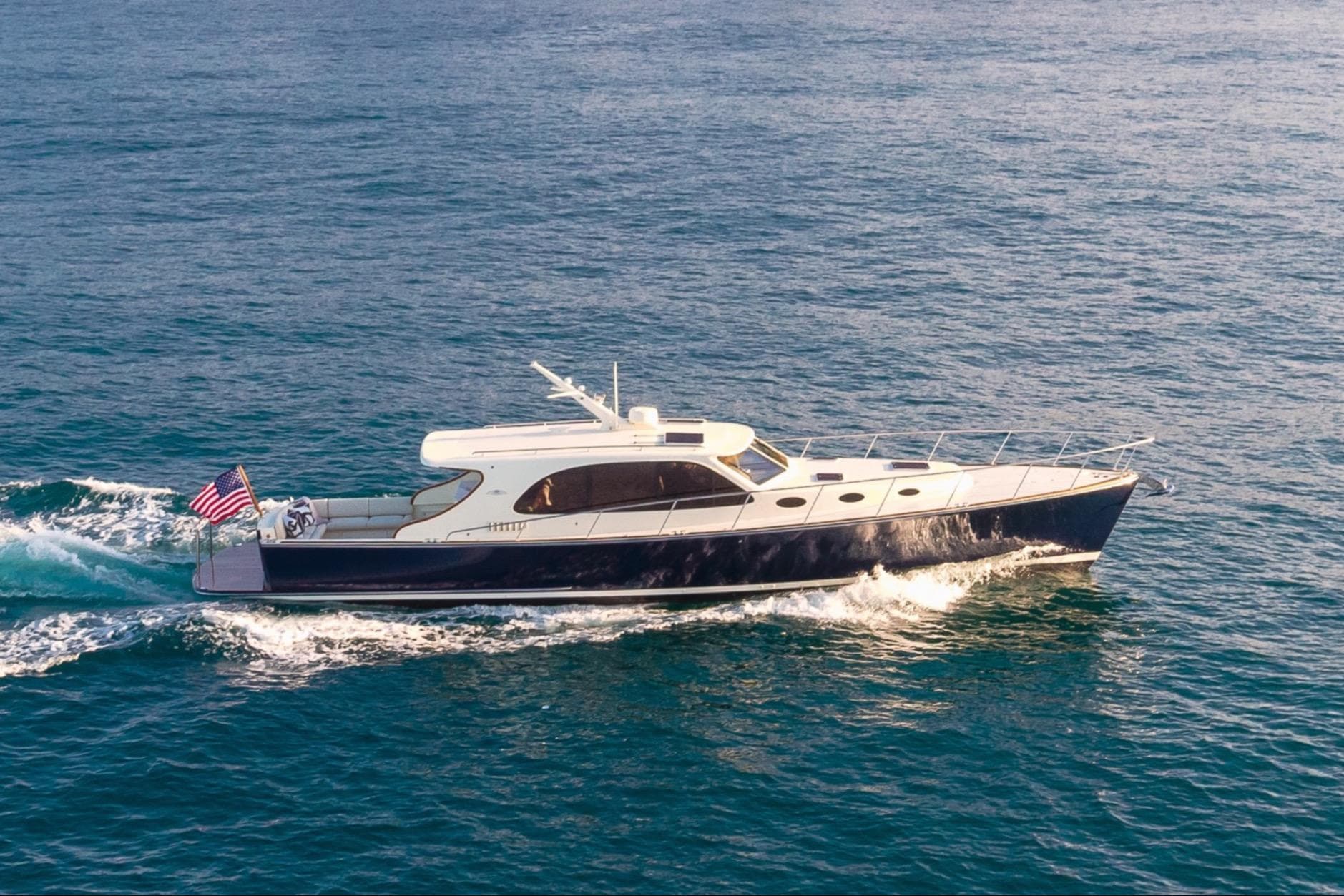 2026 Palm Beach Motor Yachts PB50 cruising on open water.