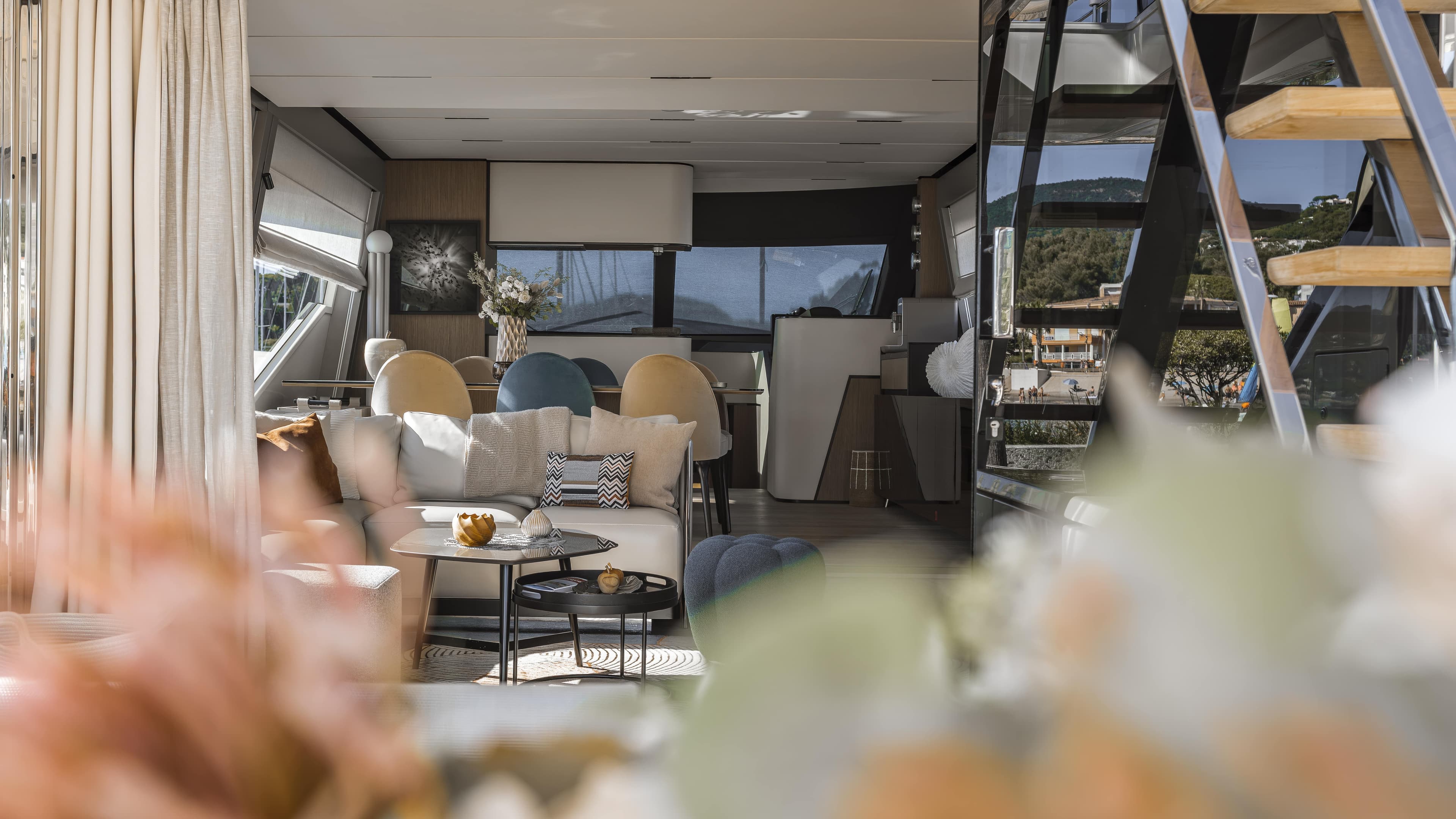 Luxurious interior of 2022 Ferretti Yachts 720, featuring elegant seating and modern decor.
