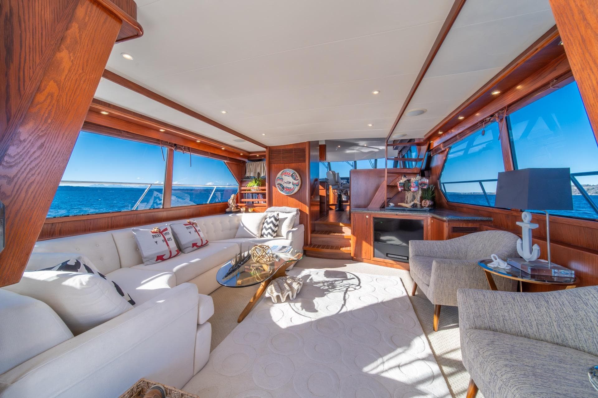 Luxurious interior of 1998 West Bay 58 Sonship Pilothouse MY yacht with elegant furnishings.