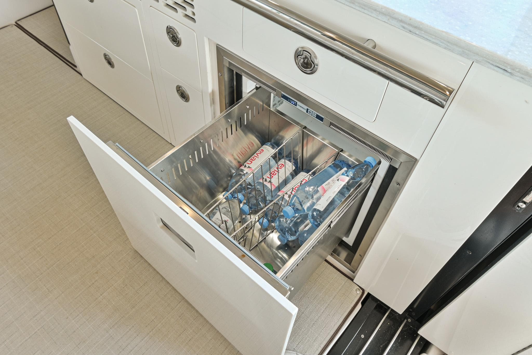 Open drawer refrigerator in 2021 Regal 36 Grande Coupe yacht kitchen.