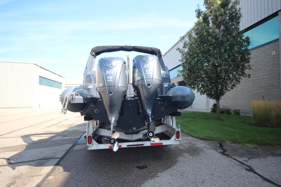 2024 Zodiac MEDLINE 9 NEO boat with twin 300hp engines on trailer.