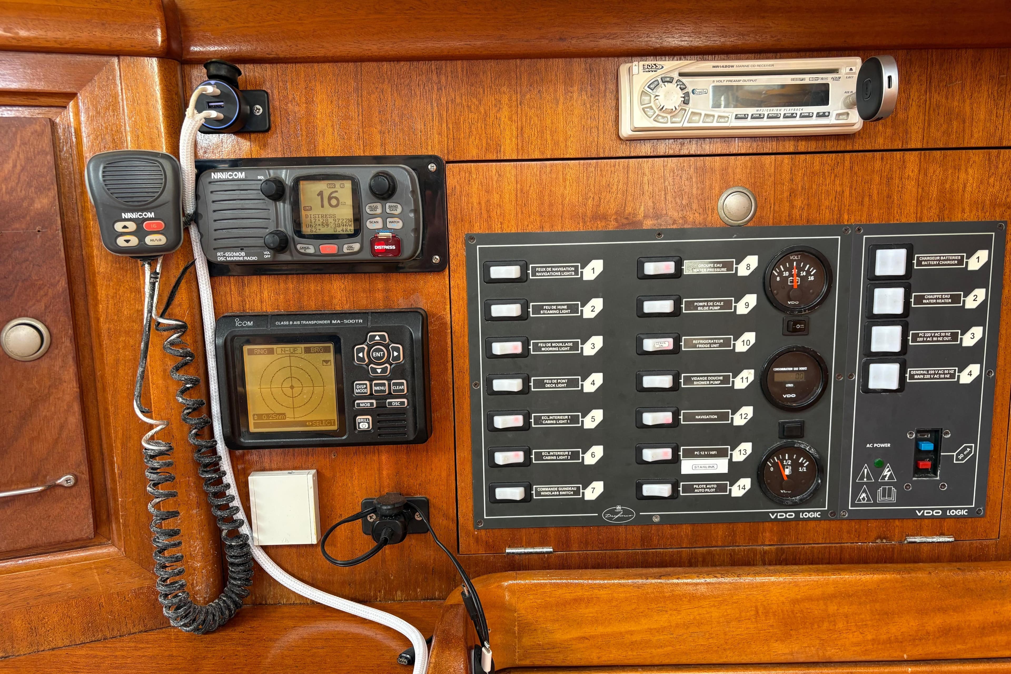 Control panel of a 1998 Dufour 35 Classic yacht with navigation and communication equipment.
