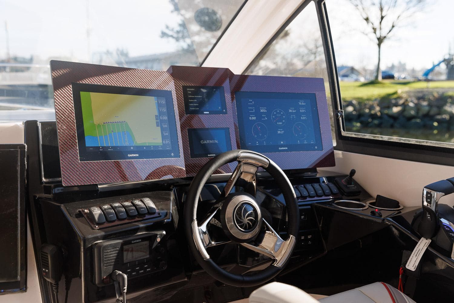 Helm of 2026 Solara S-310 Sport Bridge with advanced navigation displays.