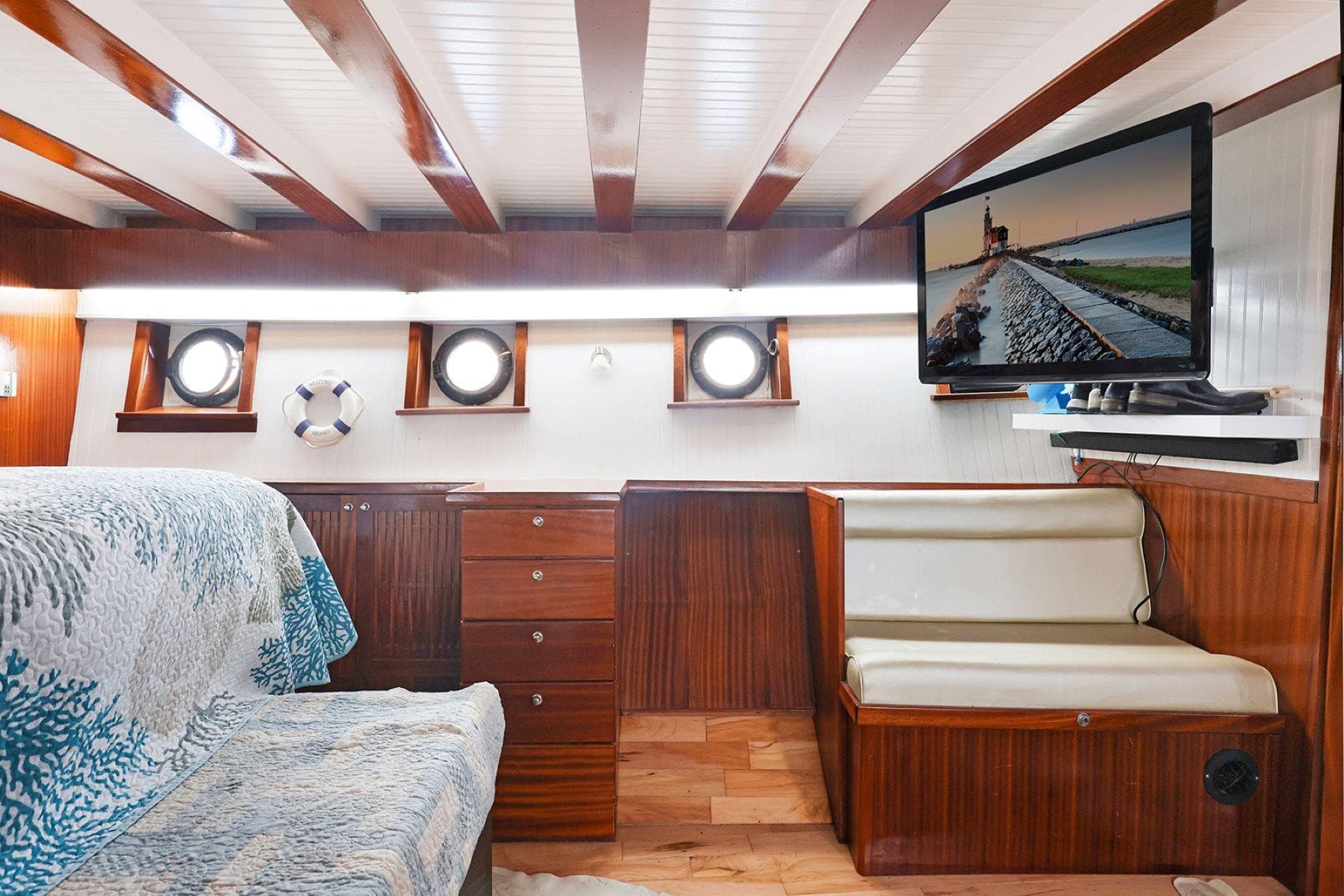 Vintage 1935 Fenner & Hood Heritage Cruiser interior with wood paneling and modern amenities.