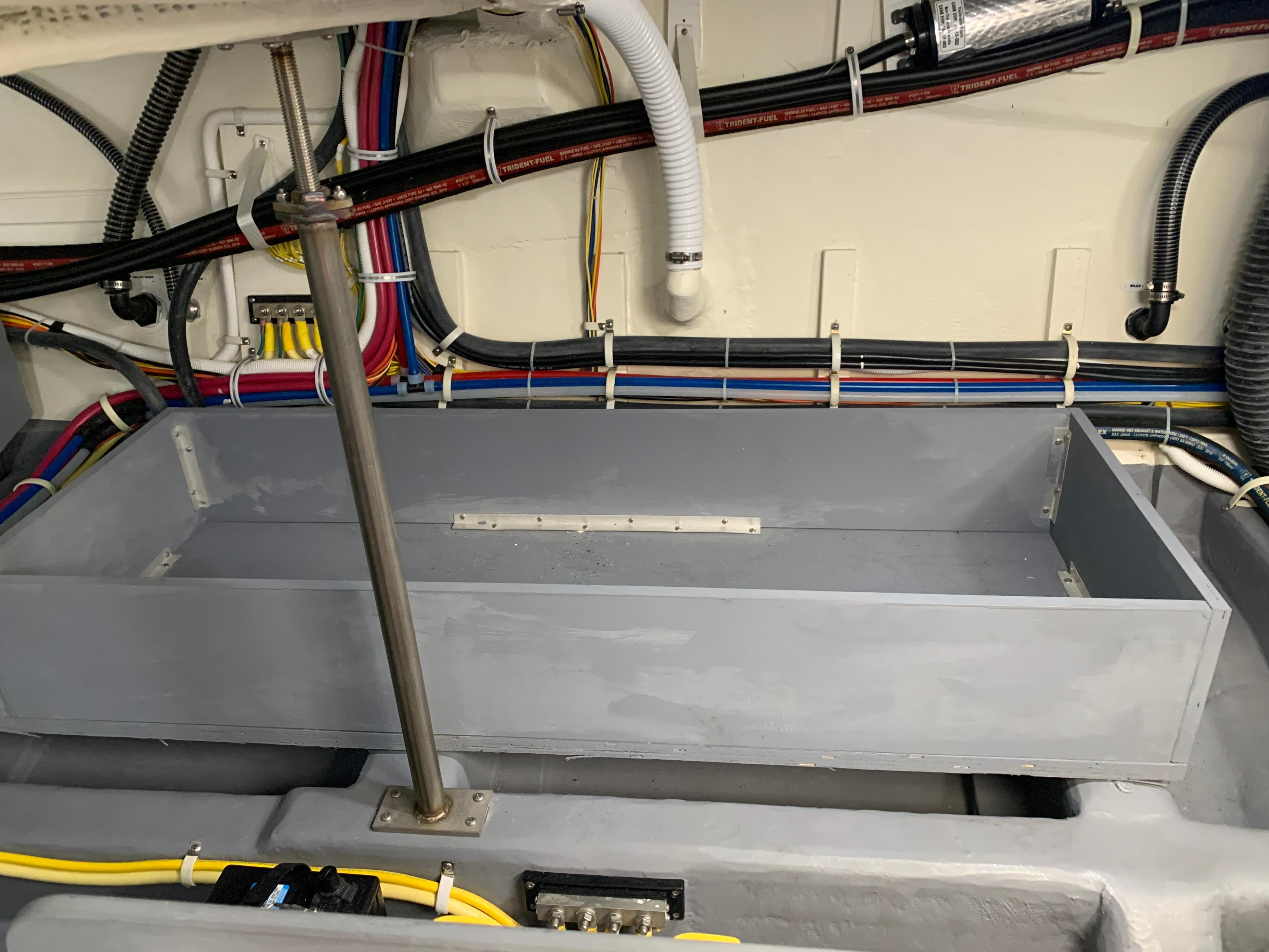 Engine compartment of a 2020 Carver C37 Coupe with organized wiring.