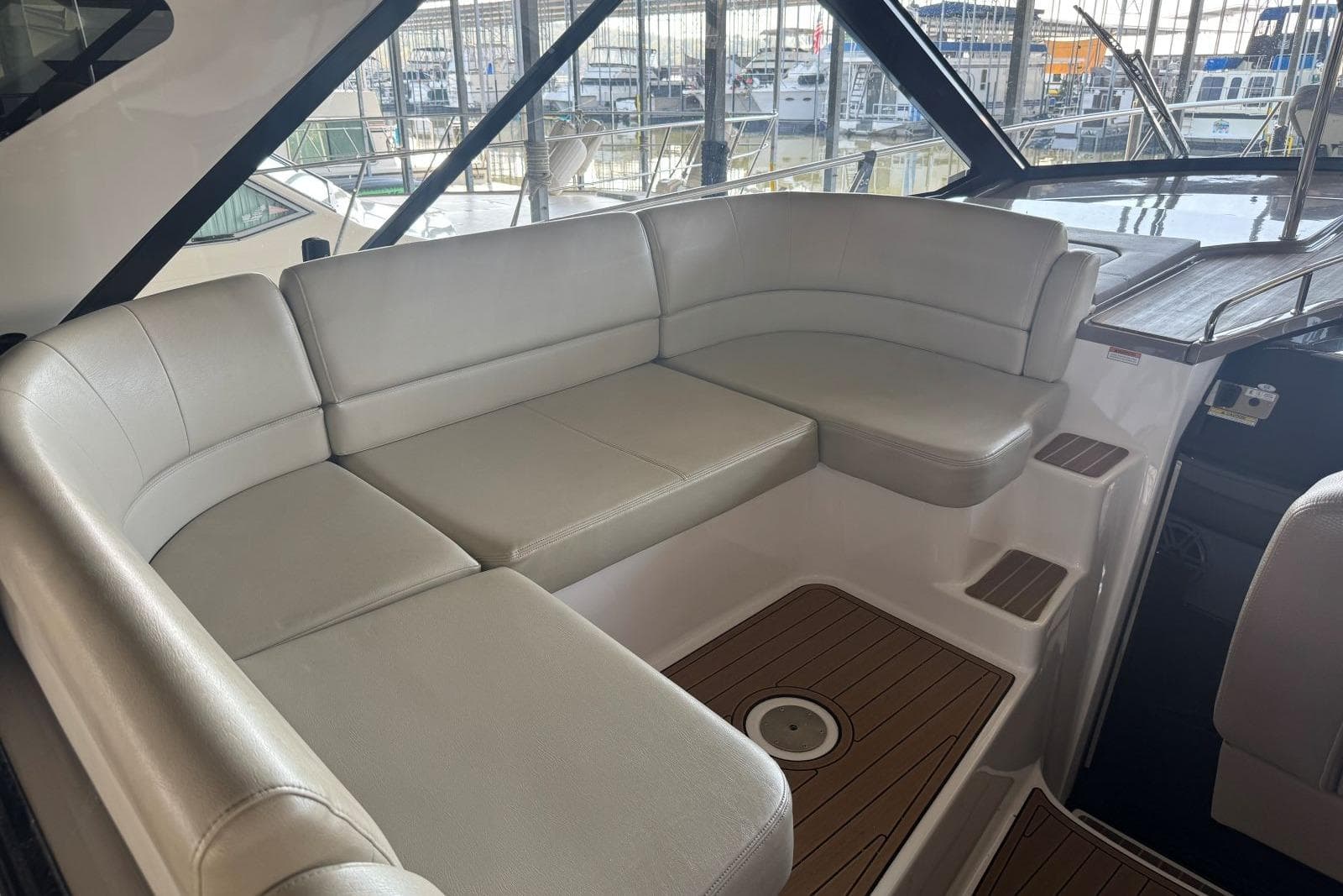 Luxurious seating area on a 2016 Regal 46 Sport Coupe yacht.