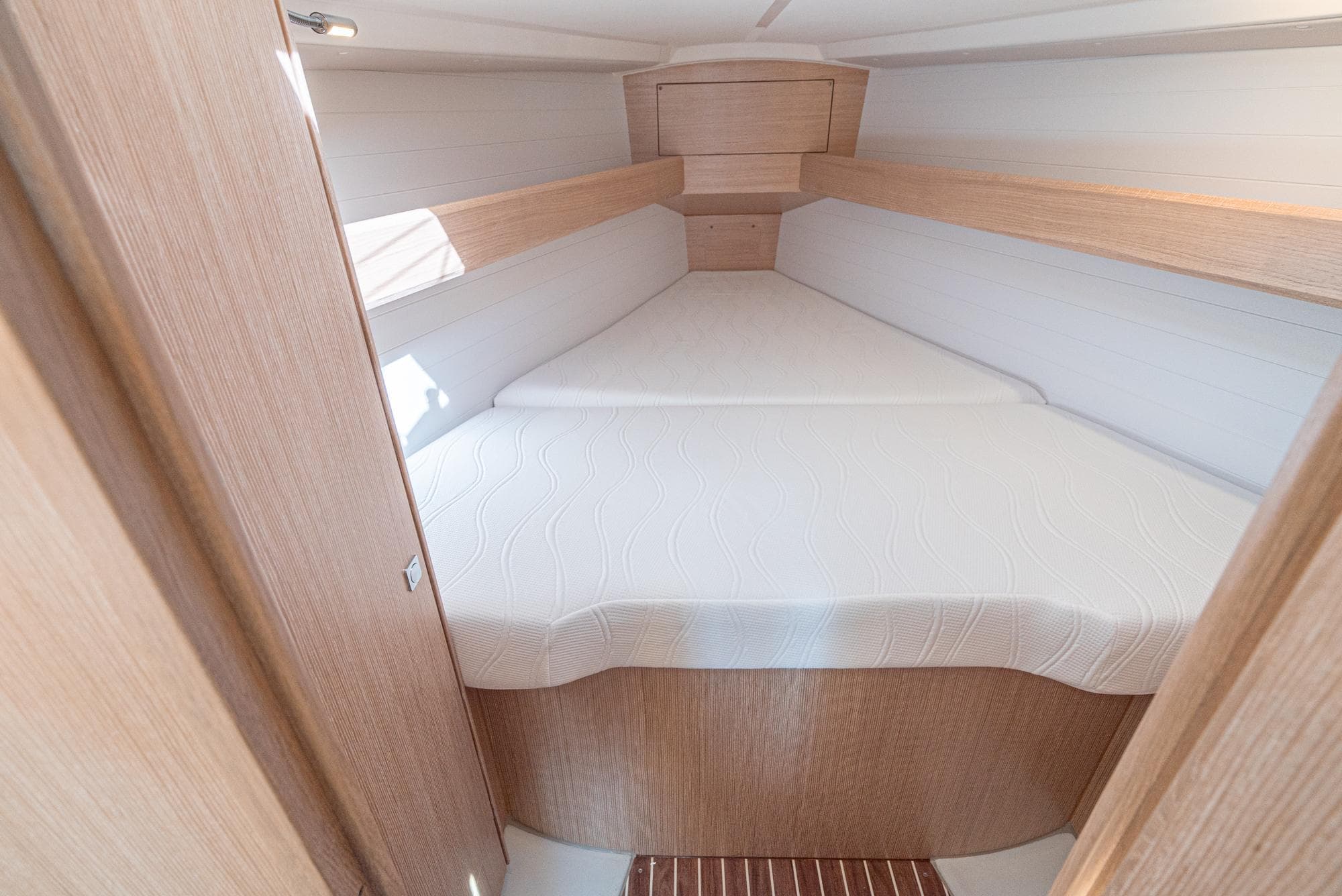 2024 Bavaria Cruiser 34 forward cabin with a spacious double bed.
