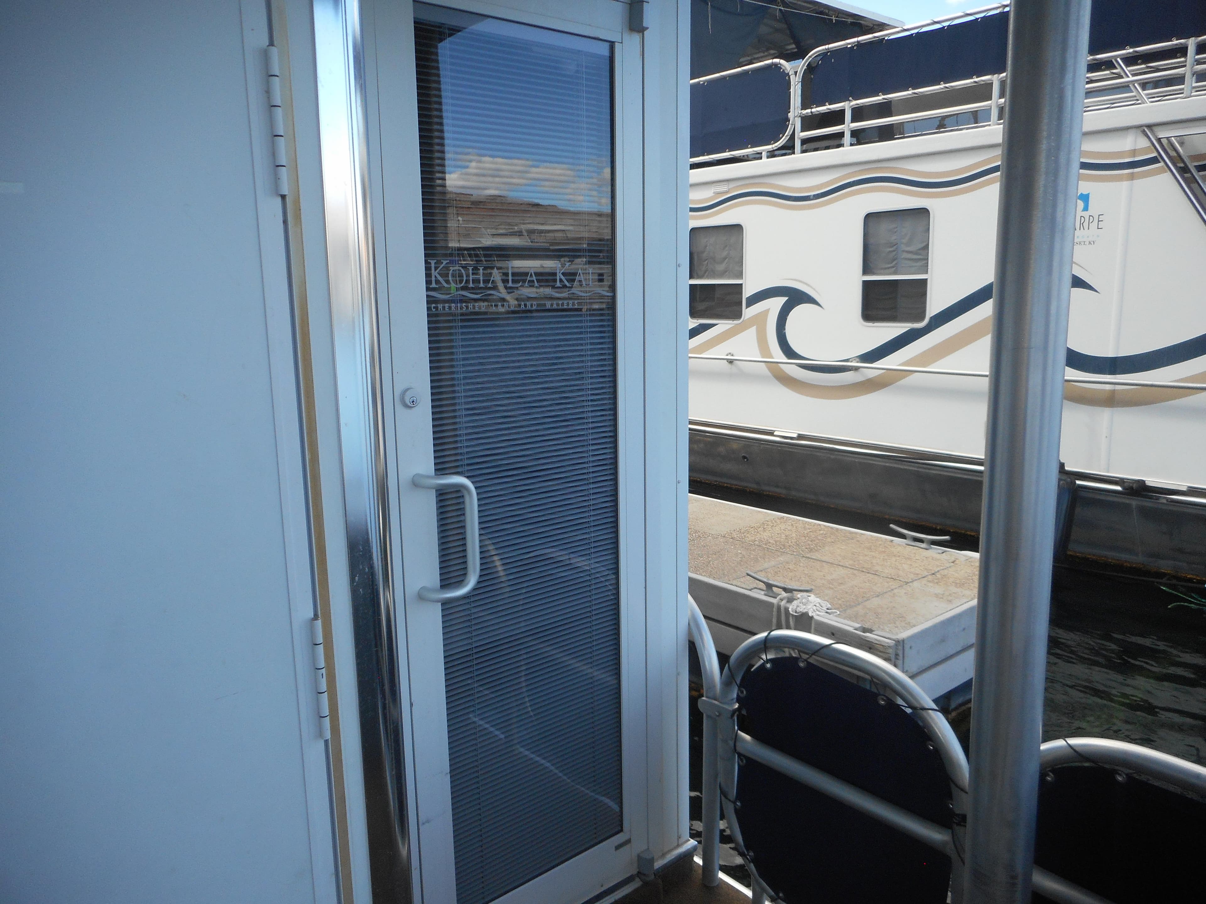 Entrance door of a Sharpe Kohala Sun Trip houseboat, 2008.
