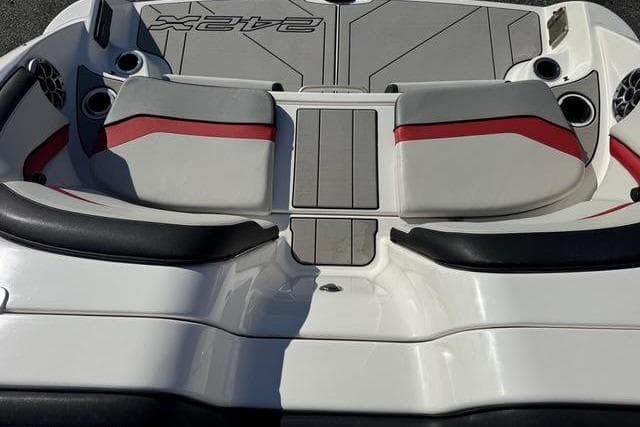 Yamaha 242X E-Series 2020 boat rear with seating cushions.