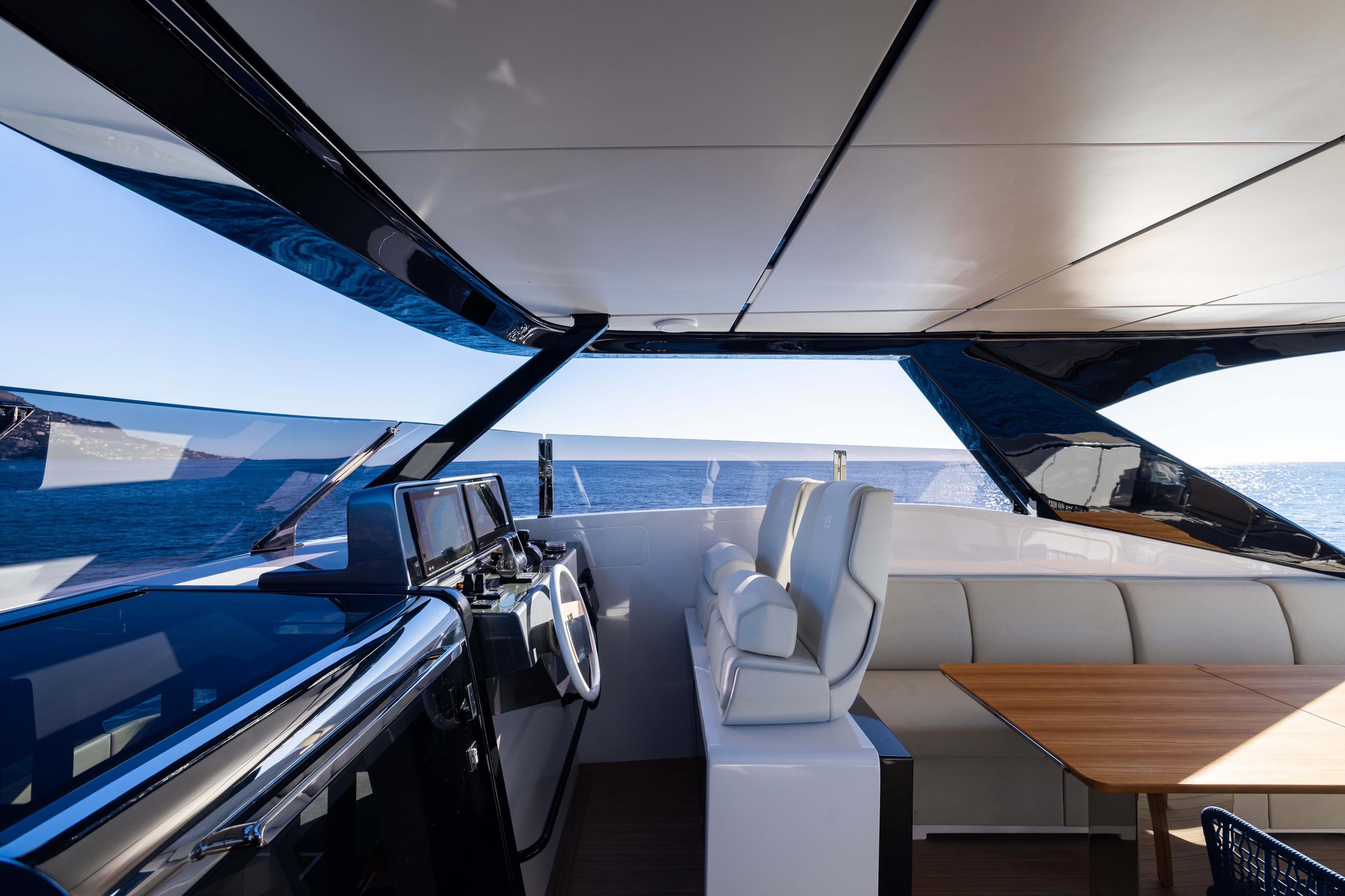 Luxurious interior of 2025 Ferretti Yachts INFYNITO 80, featuring sleek design and ocean view.