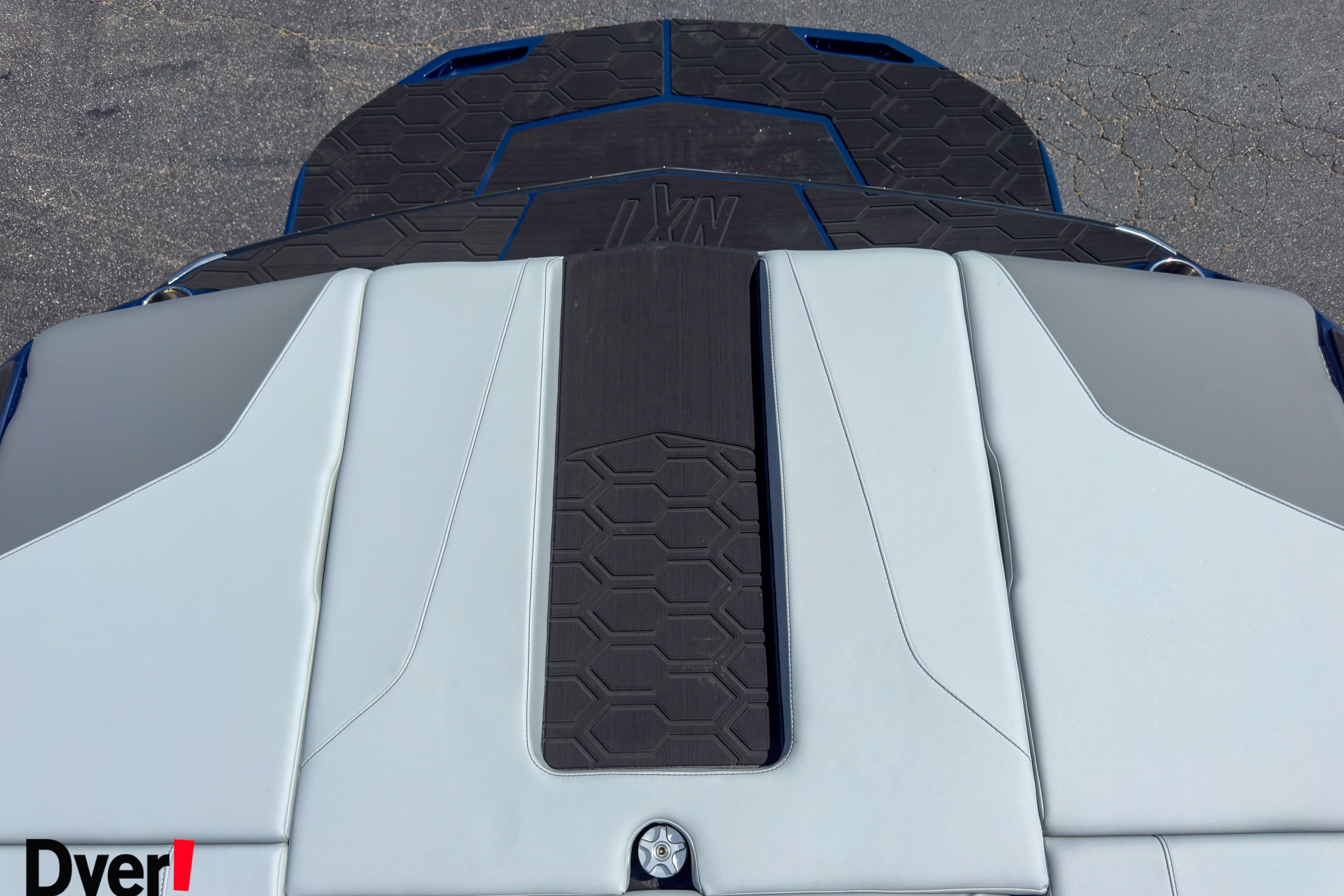 2026 MasterCraft NXT22 boat deck with sleek design and textured surface.